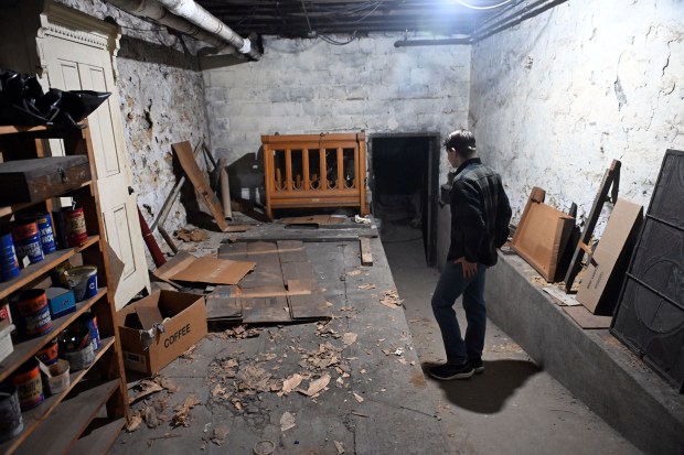 Alexander Shuman, 16, discovered a disassembled marble altar that had lain for decades covered in cardboard and boards in a recess of First United Church of Christ, Reed and Washington streets. (BILL UHRICH/READING EAGLE)
