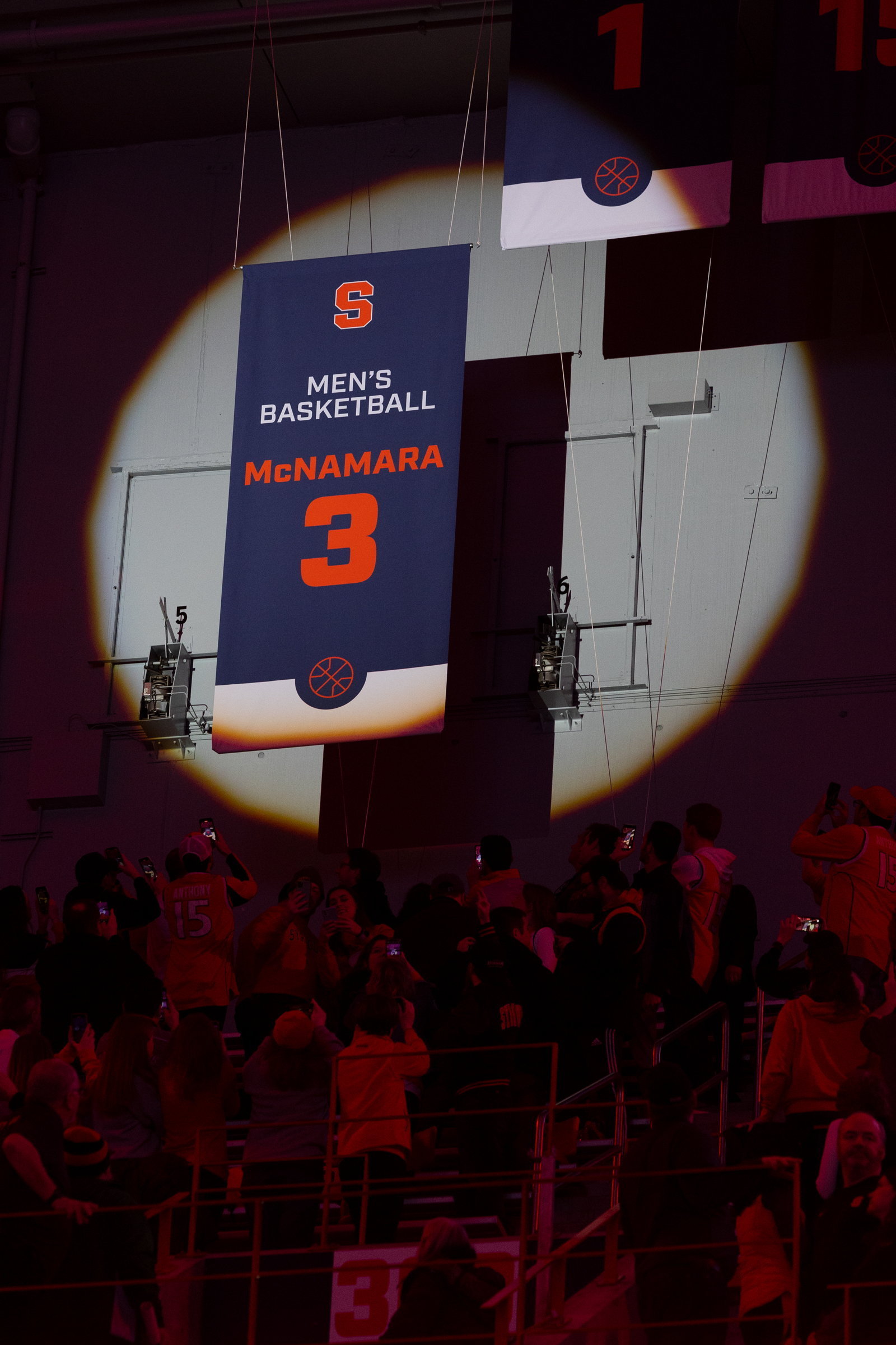 A banner with Gerry McNamara’s number is raised at the...