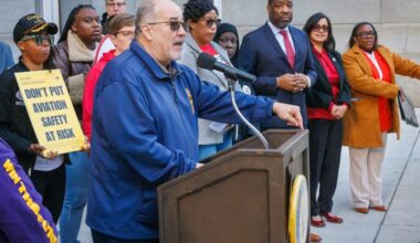 Phil Glover, national vice president of the American Federation of Government Employees, which represents TSA workers, speaks during a news conference Thursday outside City Hall. In the background, from left to right, are City Council President Kenyatta Johnson and Councilmember Nina Ahmad and Kendra Brooks.