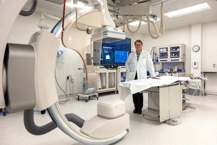 Richard Borge, medical director at AMS Surgery Center in Horsham, stands in one of the center's cardiac cath labs.