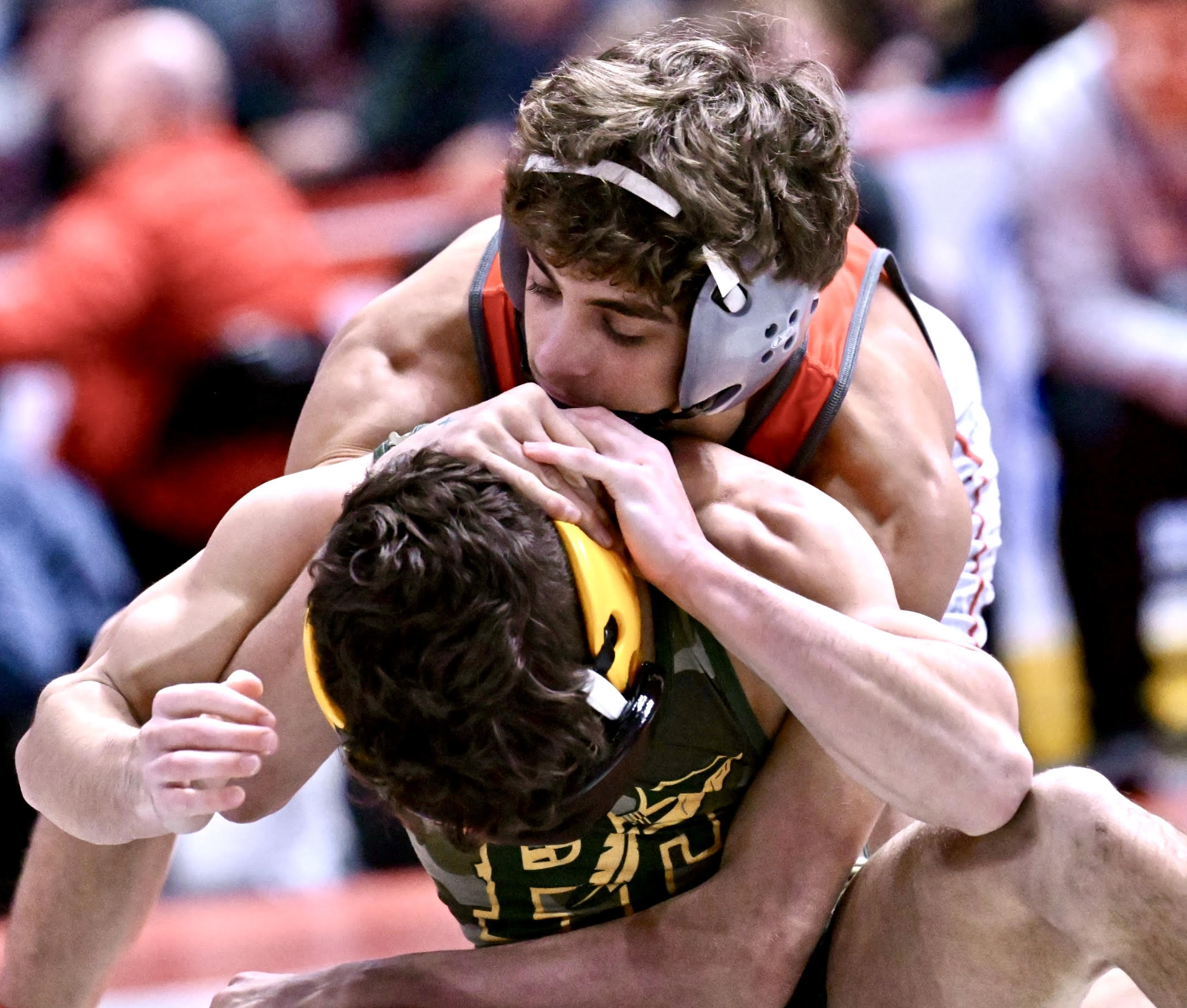 Hazleton Area’s Gabe Benyo, top, wrestles Penn-Trafford’s Dylan Barrett in...