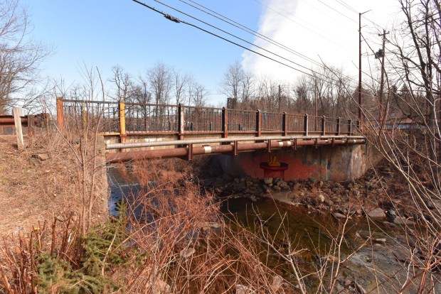The Ash St. Bridge crosses over Roaring Brook in East Scranton Monday, March 2, 2026. (SEAN MCKEAG / STAFF PHOTOGRAPHER)