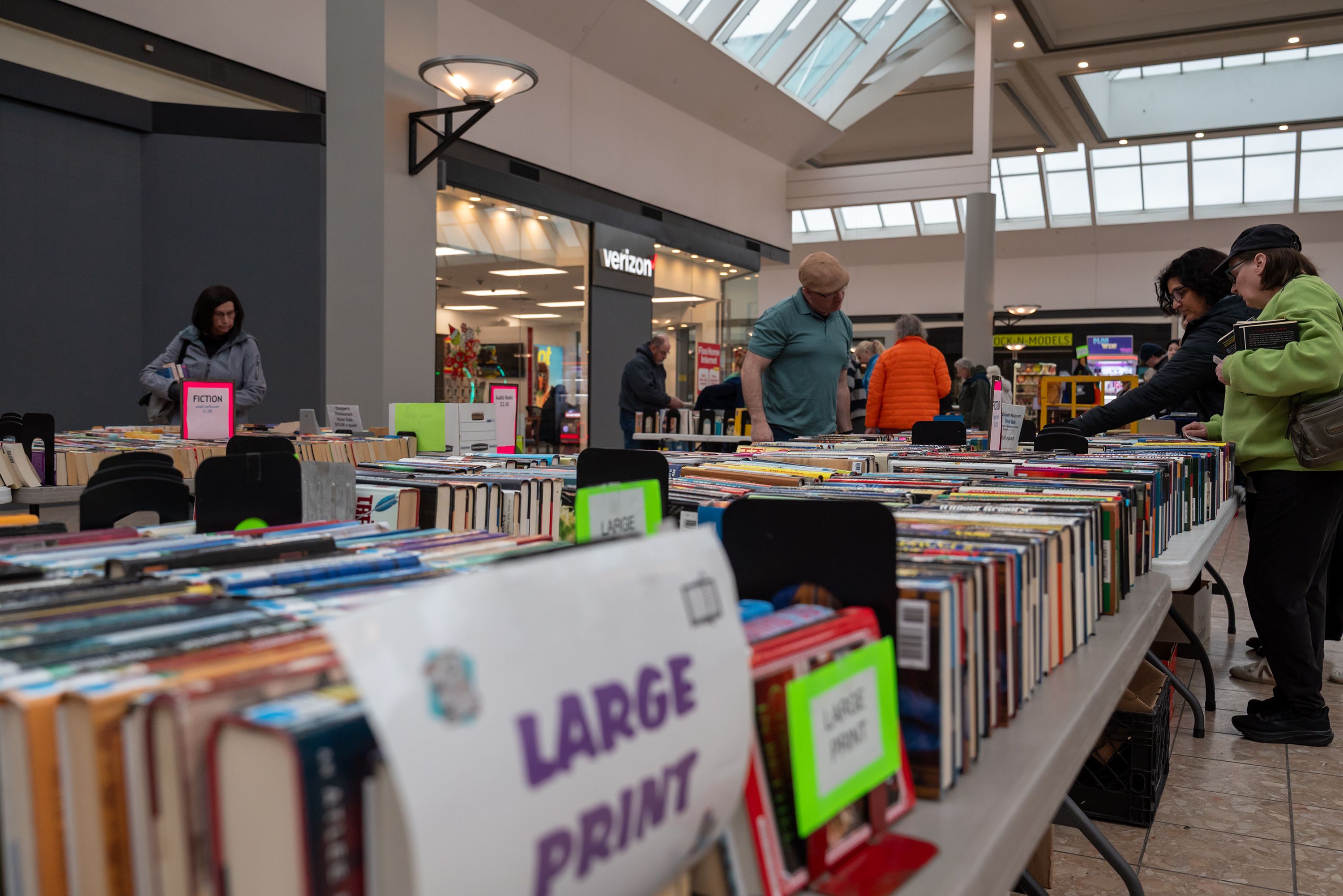 Community members browse books at the Friends of the Library...