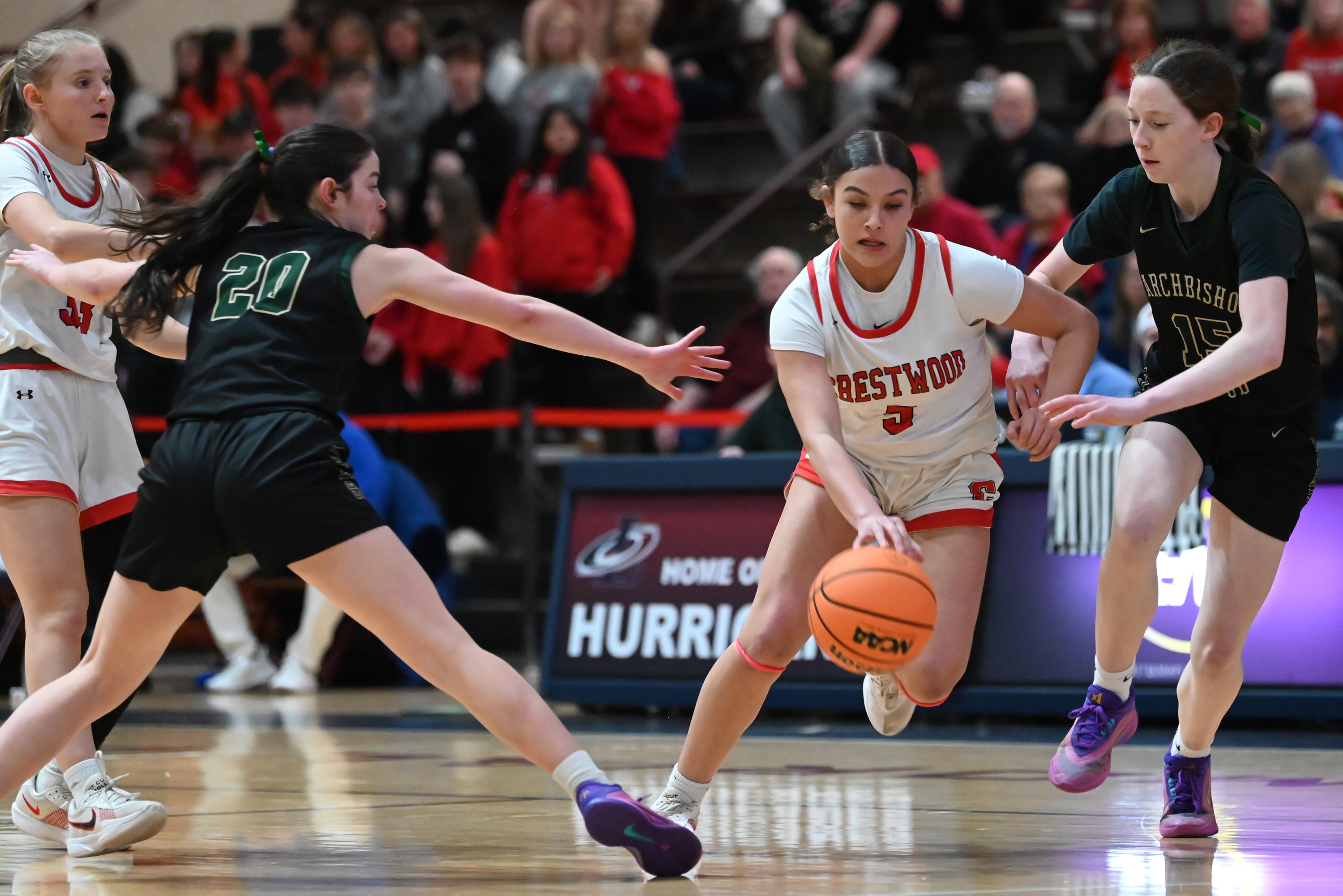 Crestwood’s Cameron Vieney moves the ball during the girls basketball...