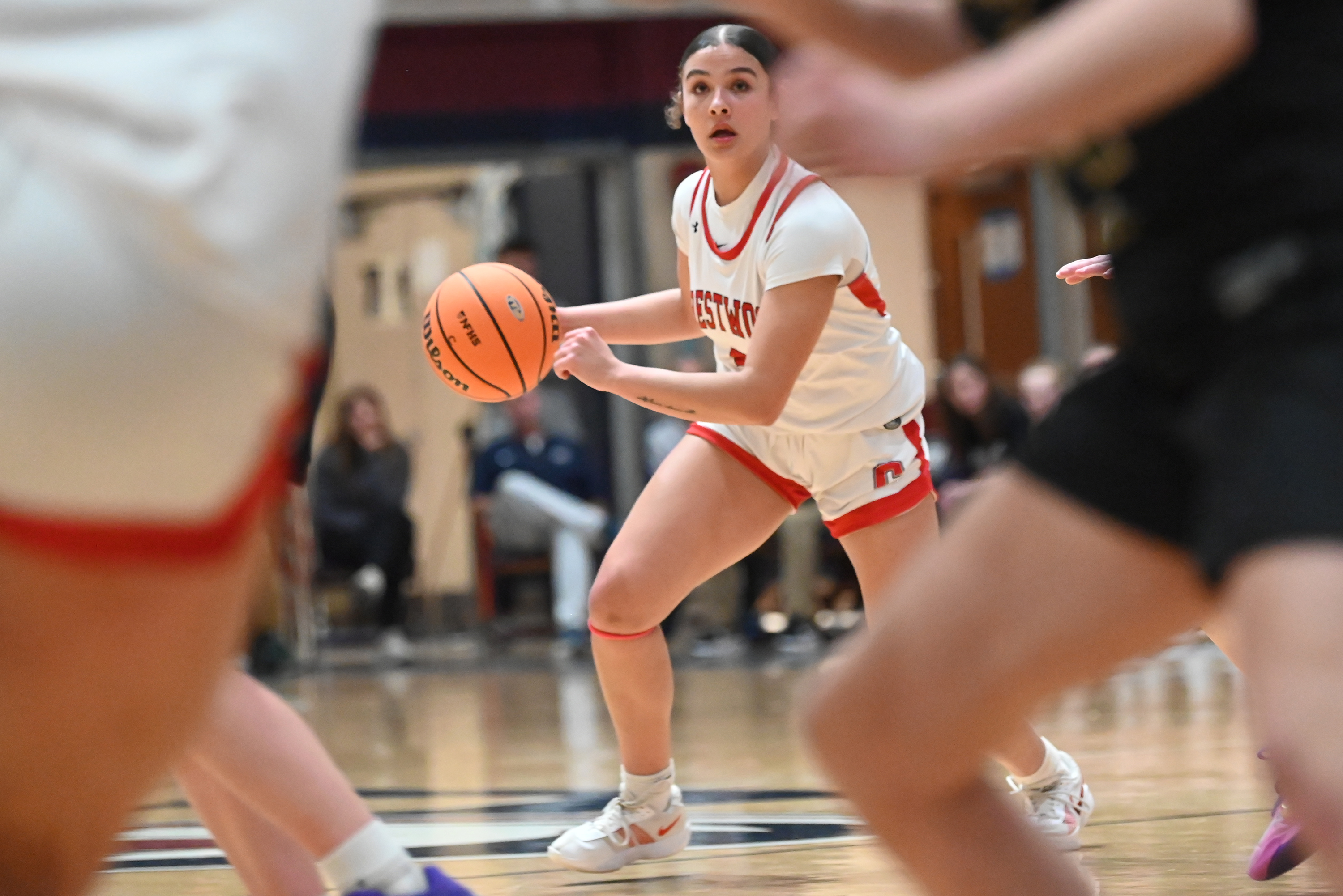 Crestwood’s Cameron Vieney controls the ball during the girls basketball...