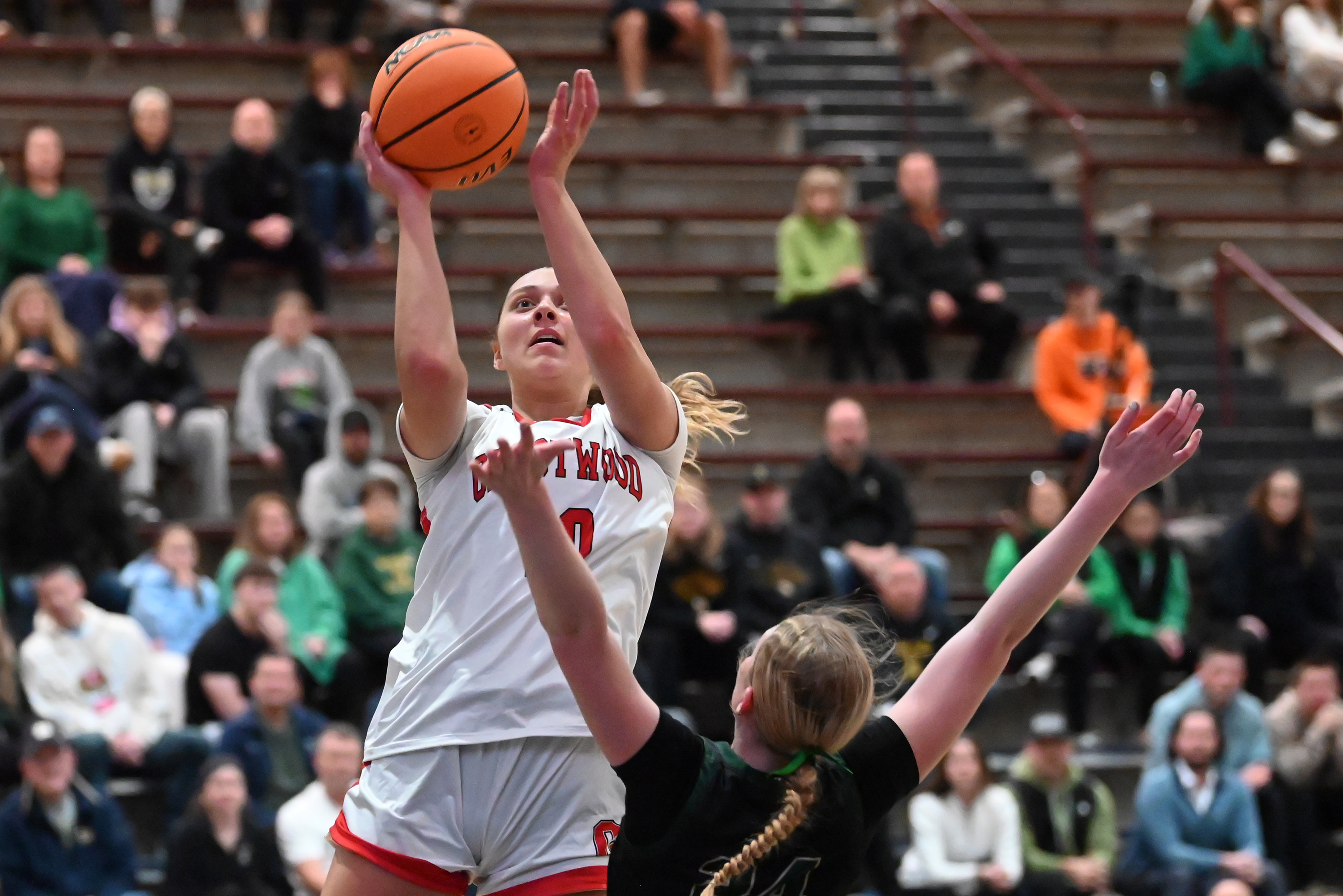 Archbishop Wood’s Abbie Kelly defends Crestwood’s Charlie Hiller during the...