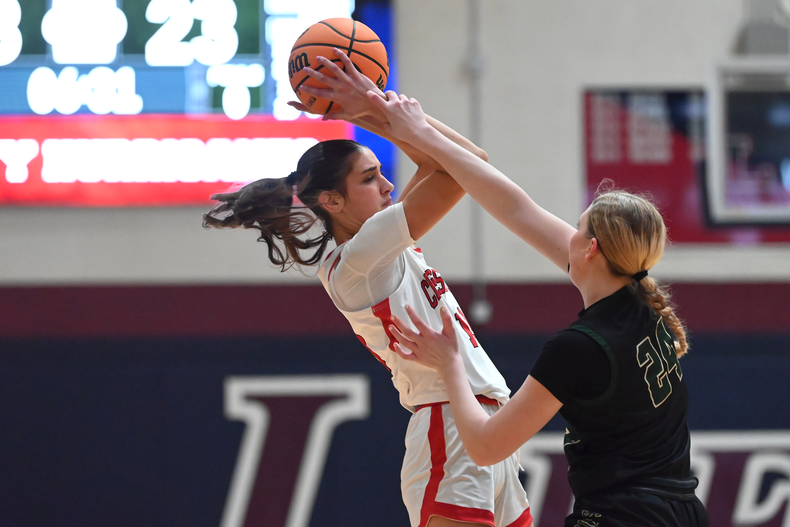 Archbishop Wood’s Abbie Kelly defends Crestwood’s Jackie Gallagher during the...