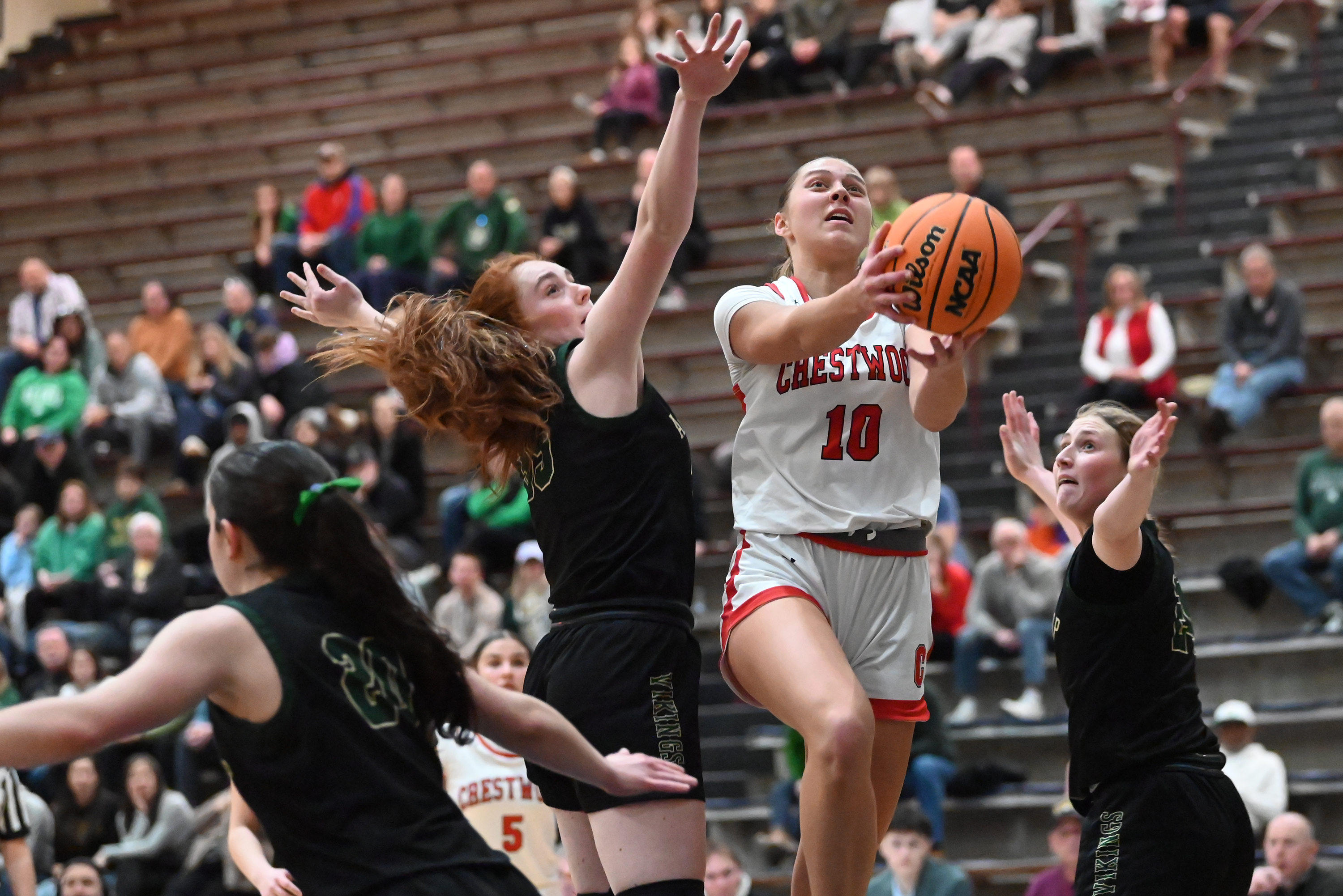 Crestwood’s Charlie Hiller carries the ball to the hoop during...