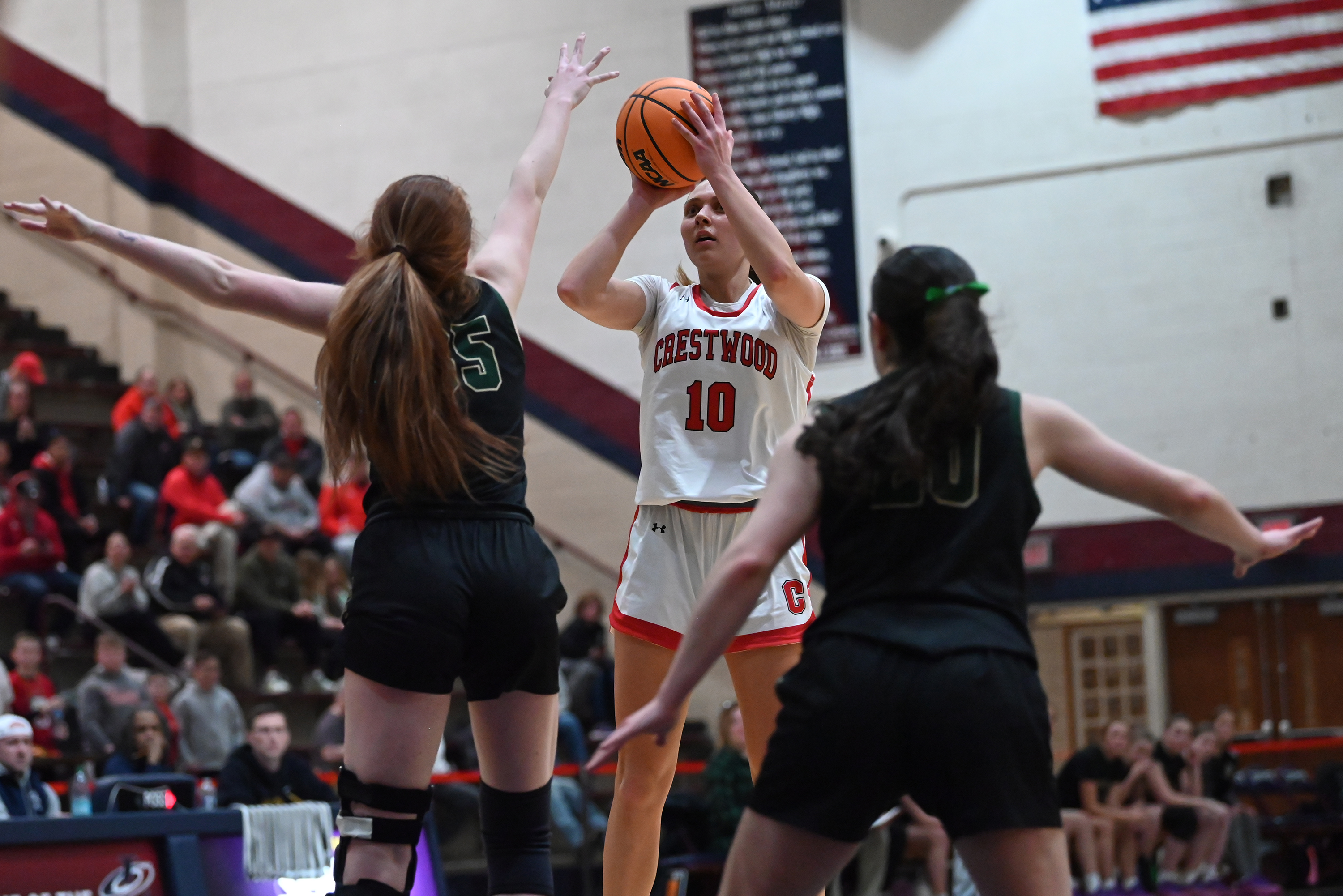 Crestwood’s Charlie Hiller takes a shot during the girls basketball...