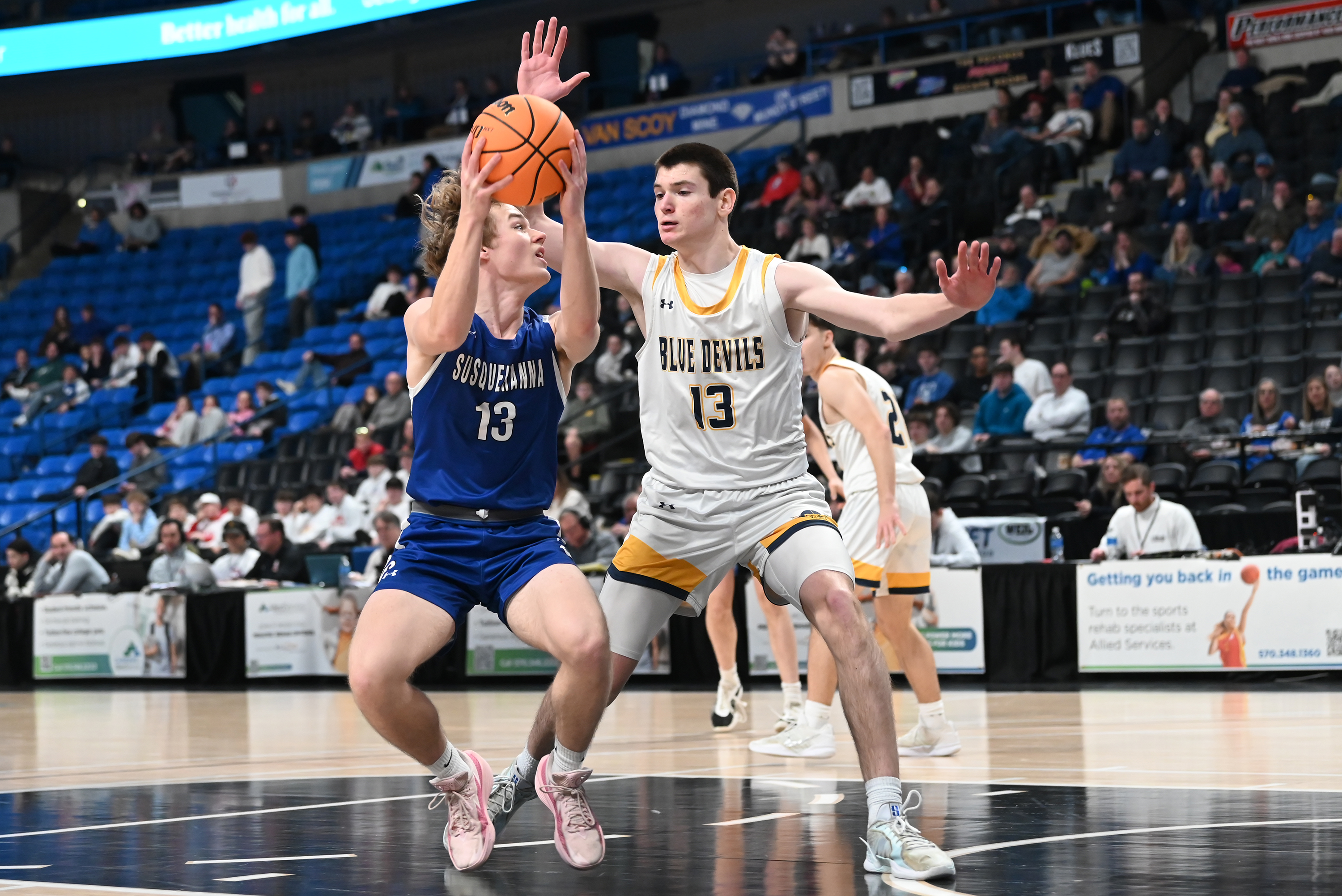 Old Forge’s Logan Fanning defends Susquehanna’s Preston Wolf during the...