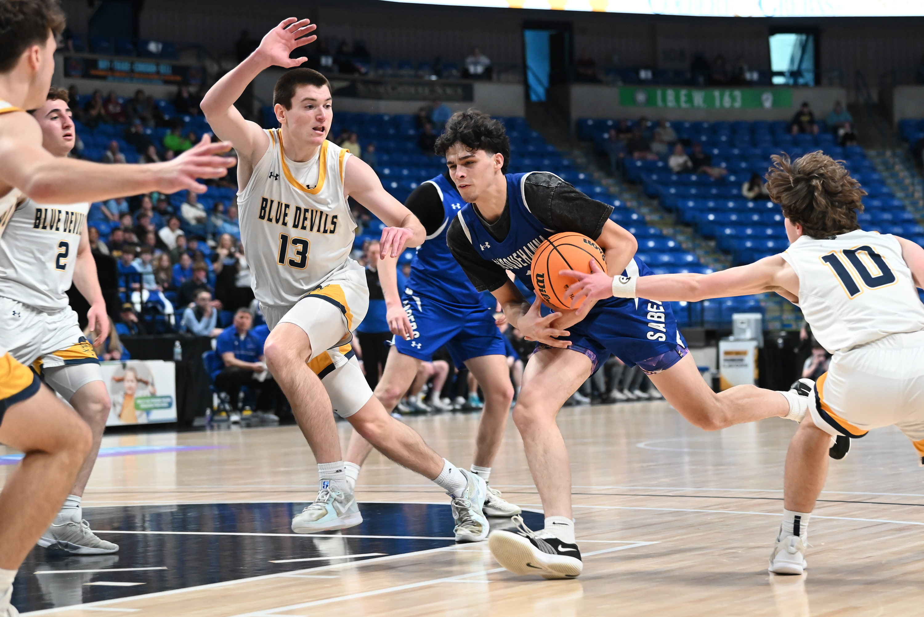Old Forge’s Camren Krushnowski reaches for the ball in Susquehanna’s...