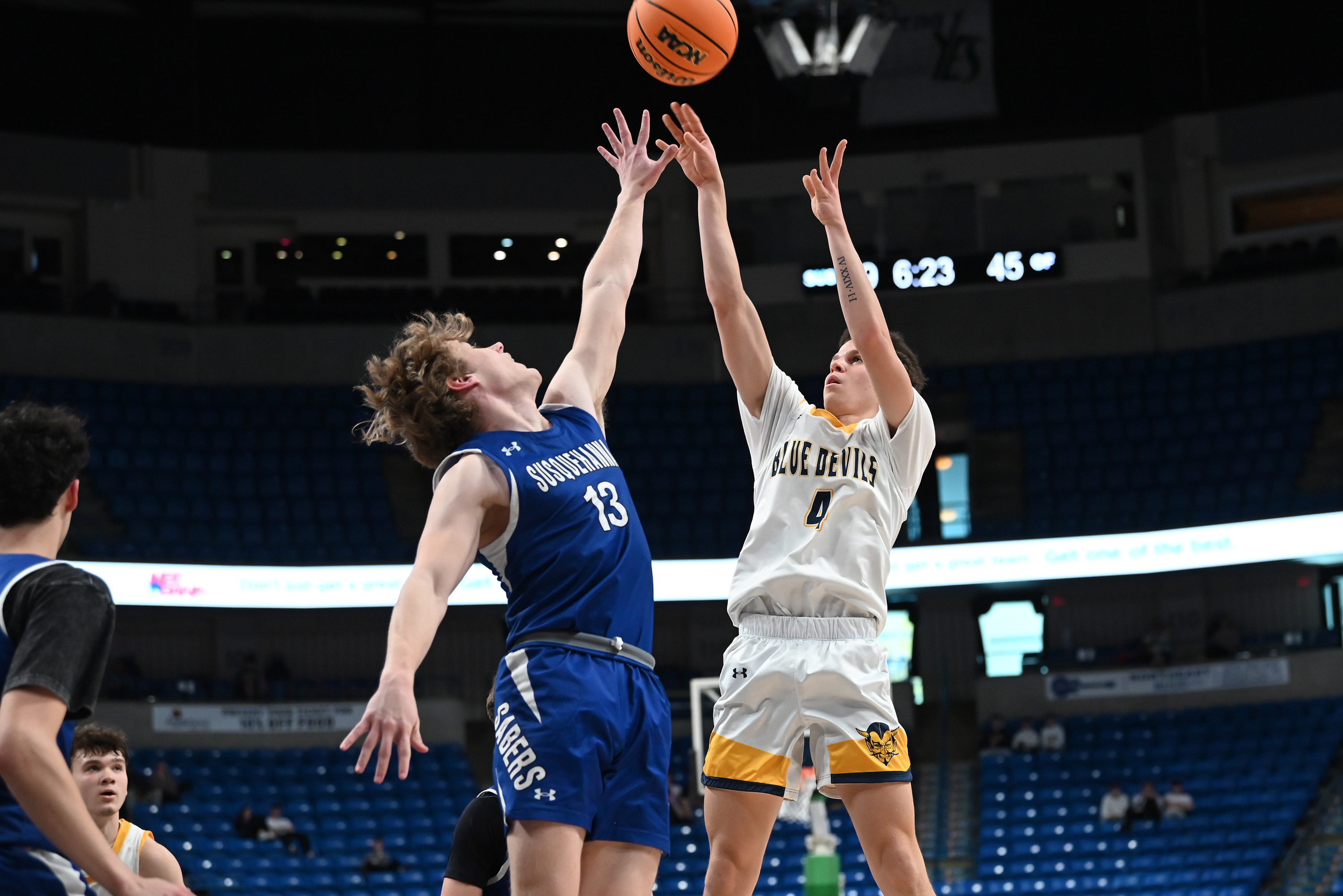 Susquehanna’s Preston Wolf defends Old Forge’s Cameron Parker during the...