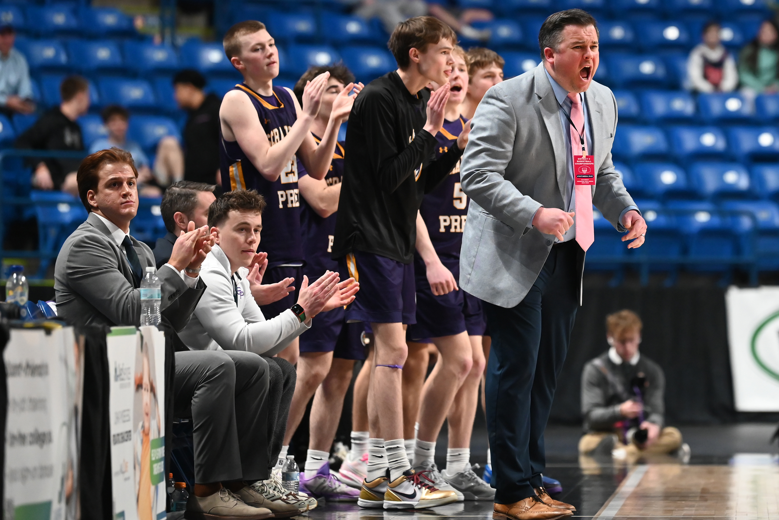 Scranton Prep’s head coach Larry Reagan calls out to his...