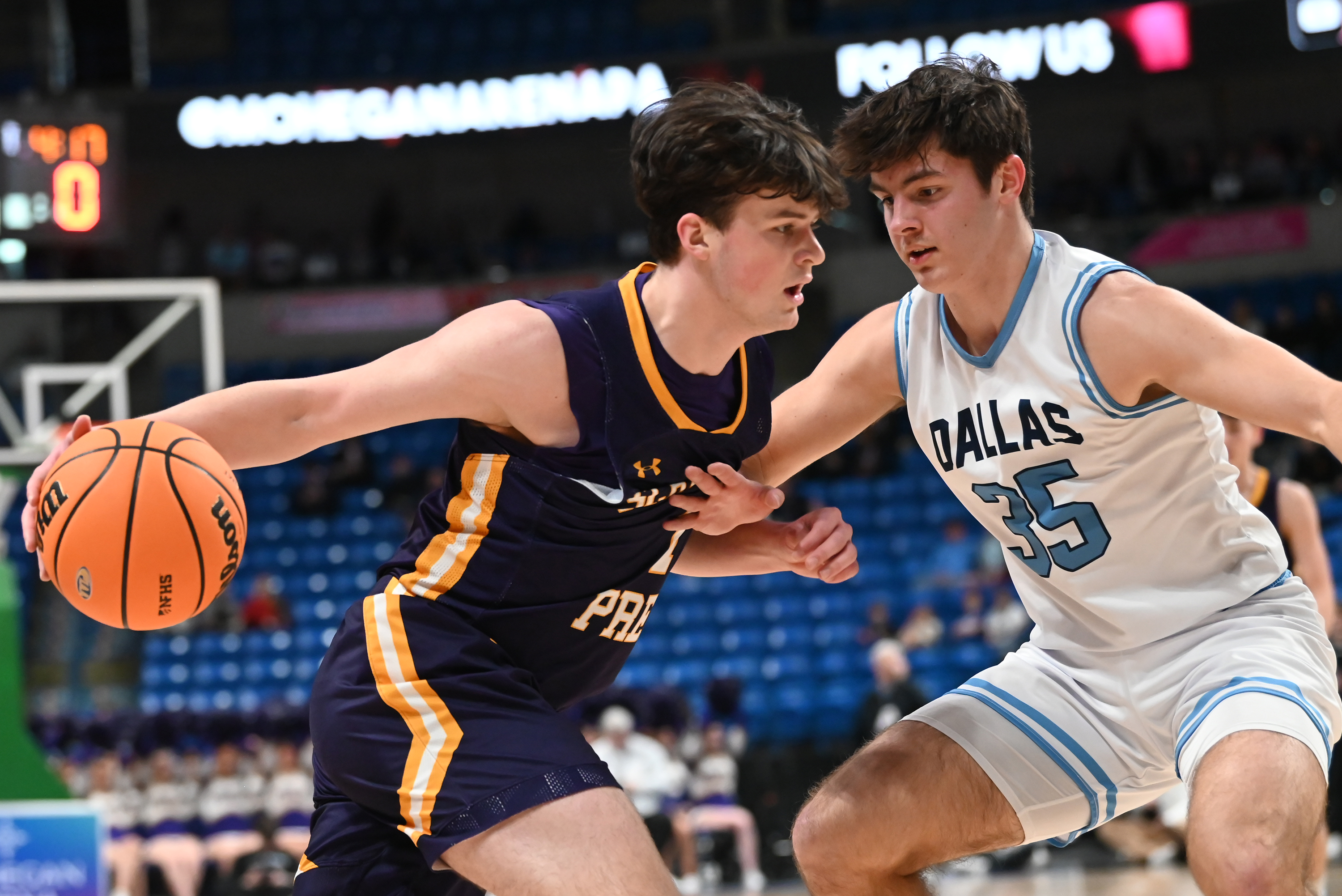 Dallas’ Talan Geskey defends Scranton Prep’s Max McGrath during the...