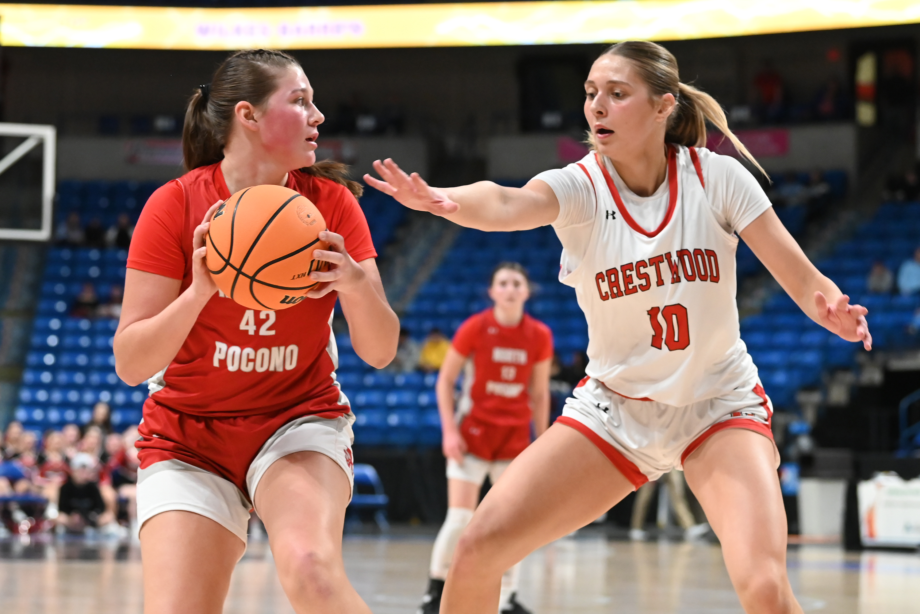 Crestwood’s Charlie Hiller defends North Pocono’s Anna Clementoni during the...