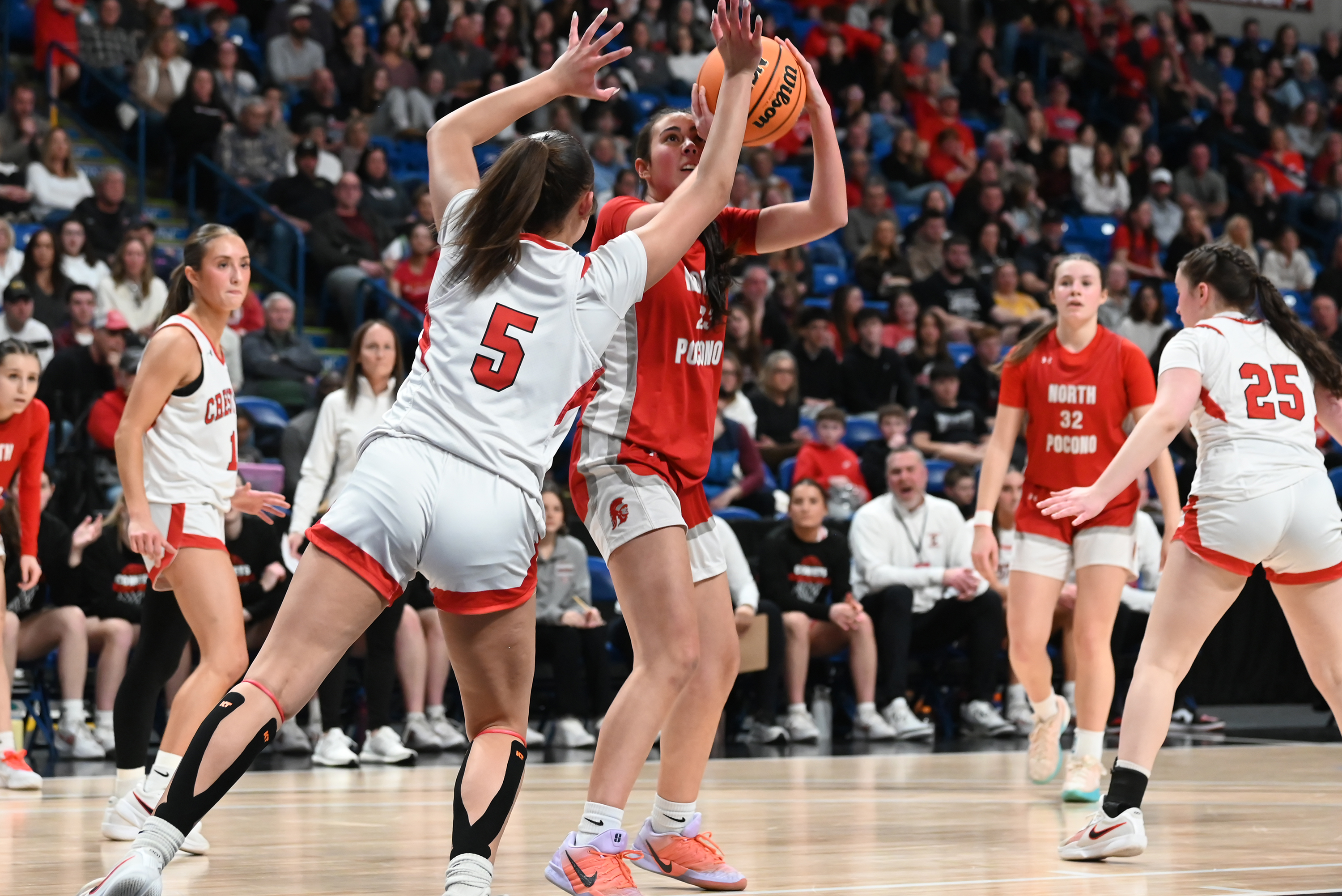 Crestwood’s Cameron Vieney defends North Pocono’s Alexis Silva during the...