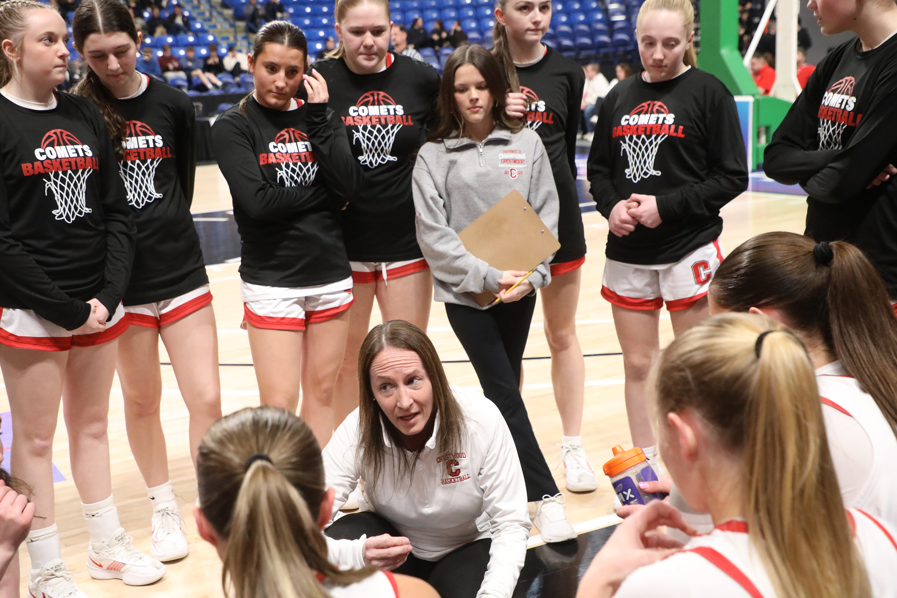 Crestwood’s head coach Mary Mushock-Namey talks to her players during...