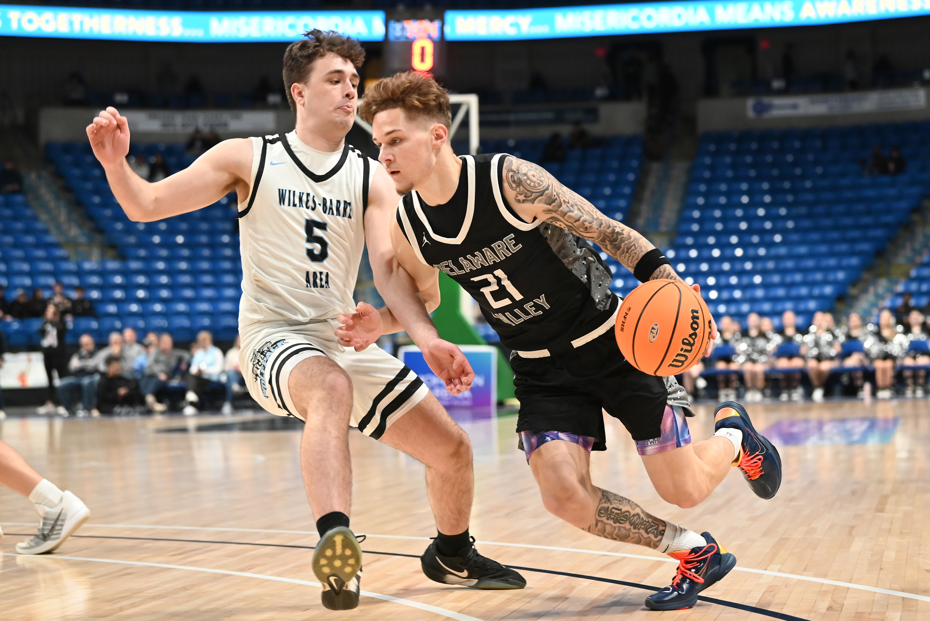 Wilkes-Barre Area’s Mike Keating defends Delaware Valley’s Tyler Lombardo during...