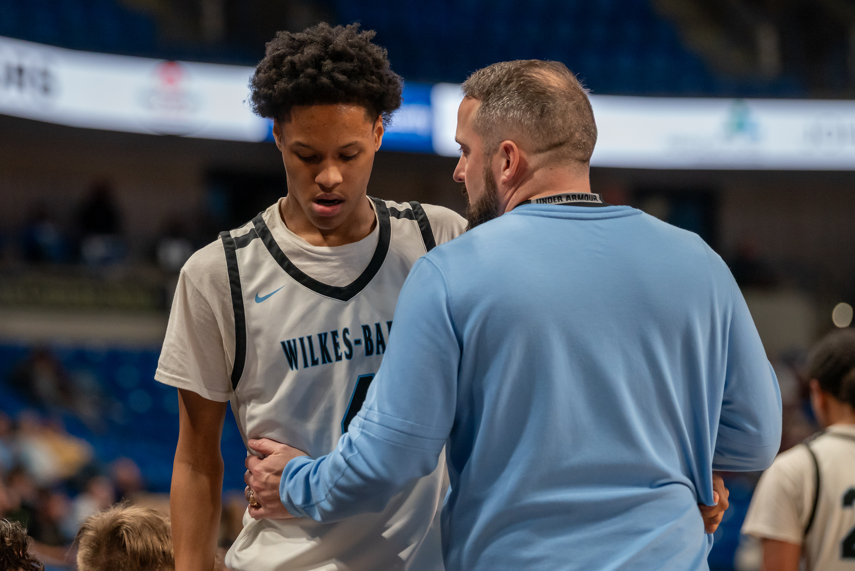 Wilkes-Barre Area’s head coach Jim Lavan talks to player Zion...