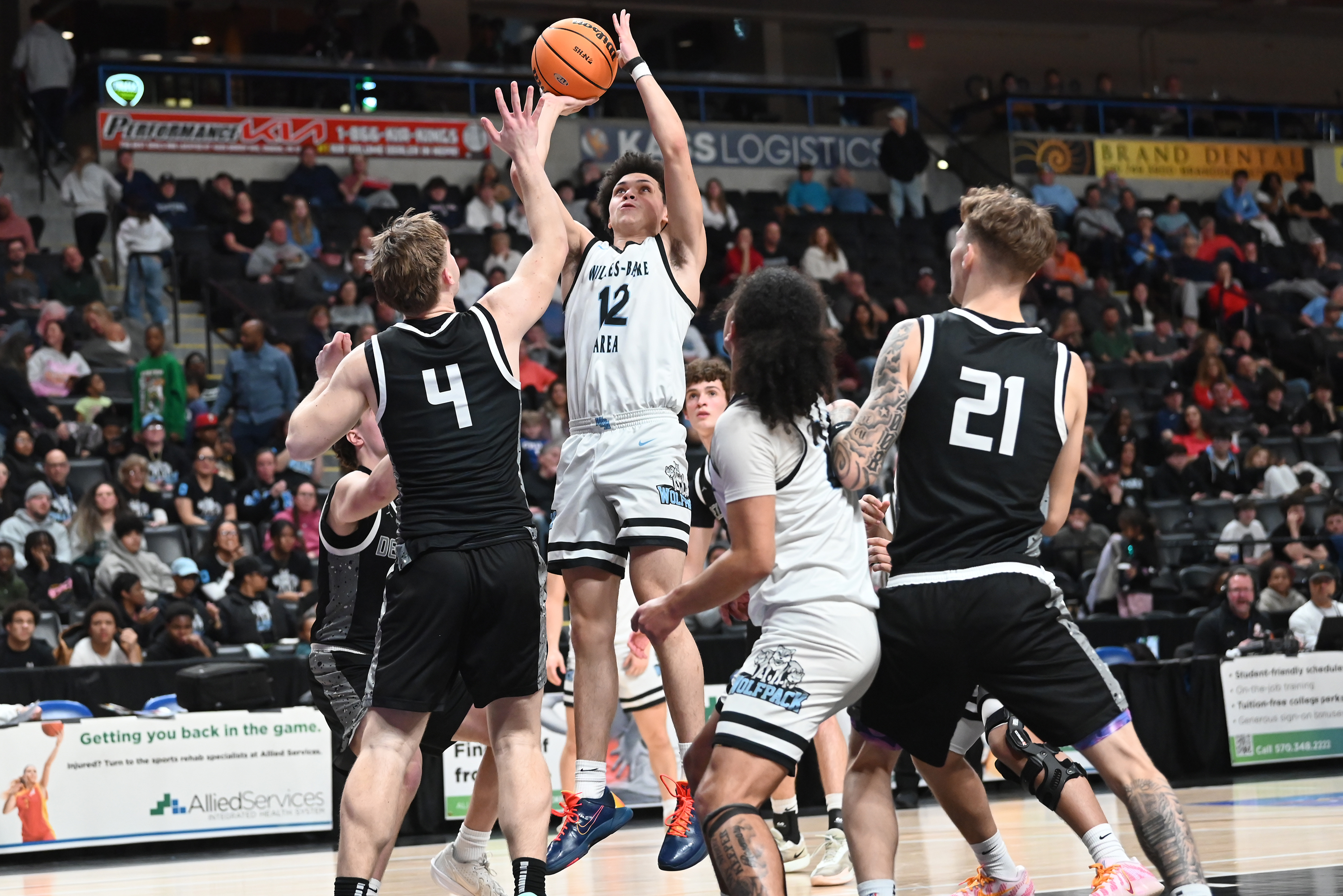 Delaware Valley’s James Dabney defends Wilkes-Barre Area’s Camrin Shovlin during...