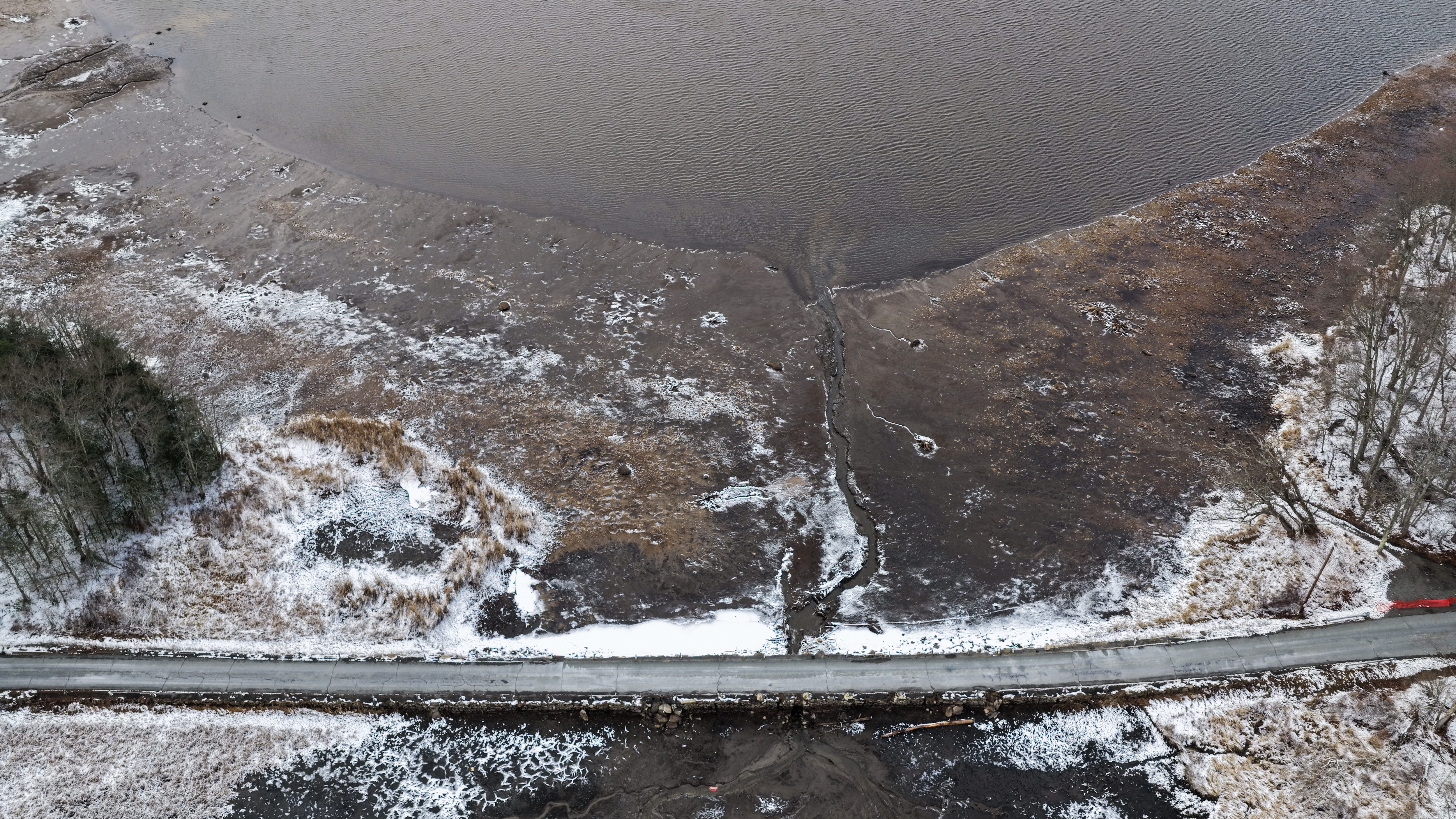 Maple Lake Road crosses over a drained portion of Maple...