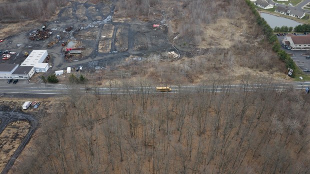 A vehicle travels on Eynon Jermyn Road in Archbald near Staback Park Friday, March 209, 2026. (SEAN MCKEAG / STAFF PHOTOGRAPHER)