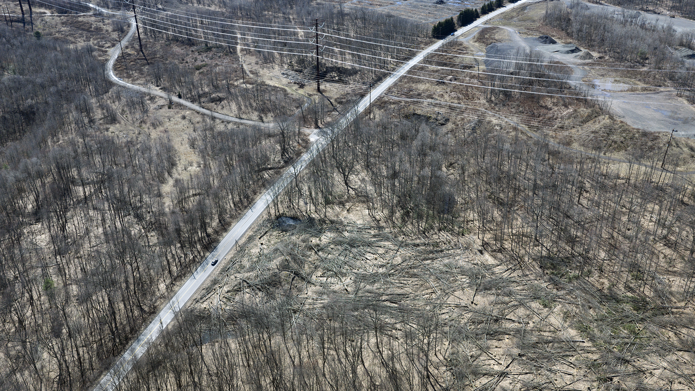 Power lines cross over Eynon Jermyn Road in Archbald Tuesday,...