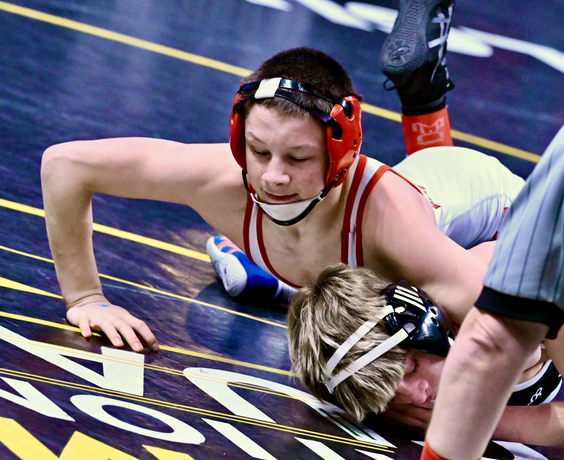 Honesdale’s Nathan Schuman, top, wrestles Faith Christian’s Riley Crandall in...
