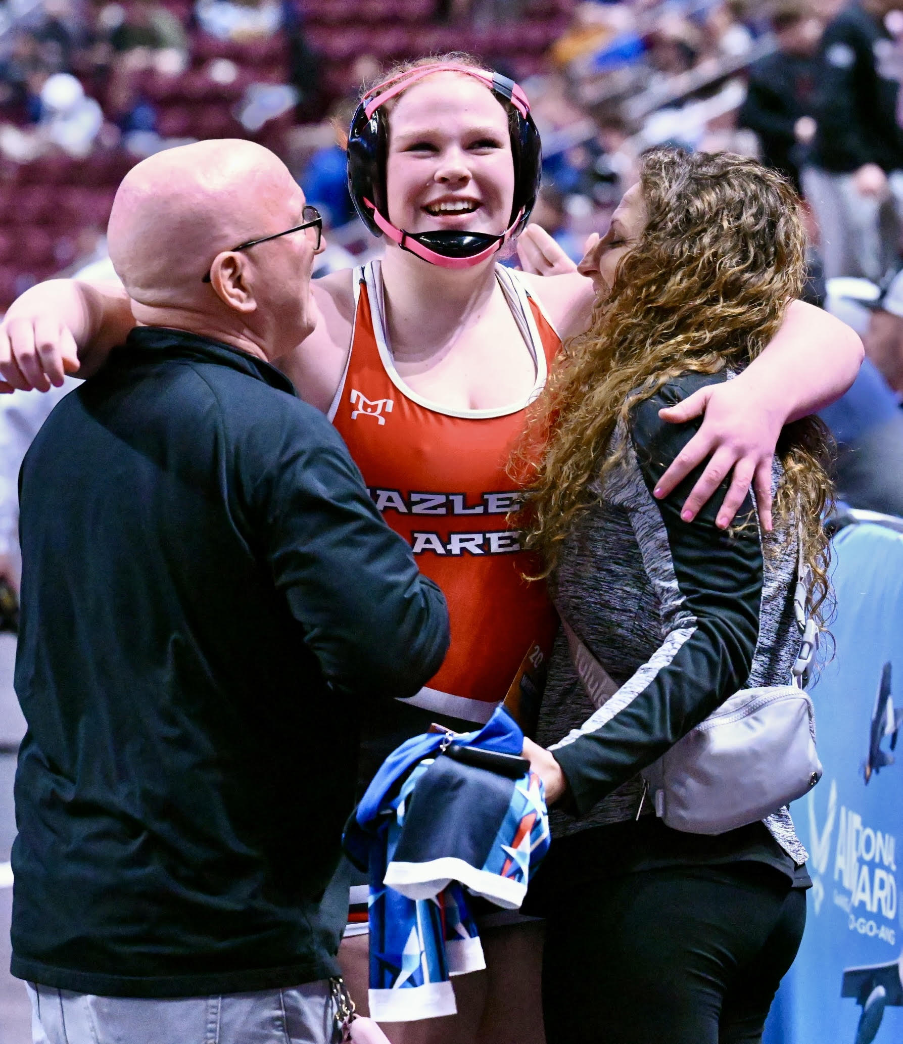 Hazleton Area’s Evelyn Sheer celebrates after pinning Albert Gallatin’s Jenna...