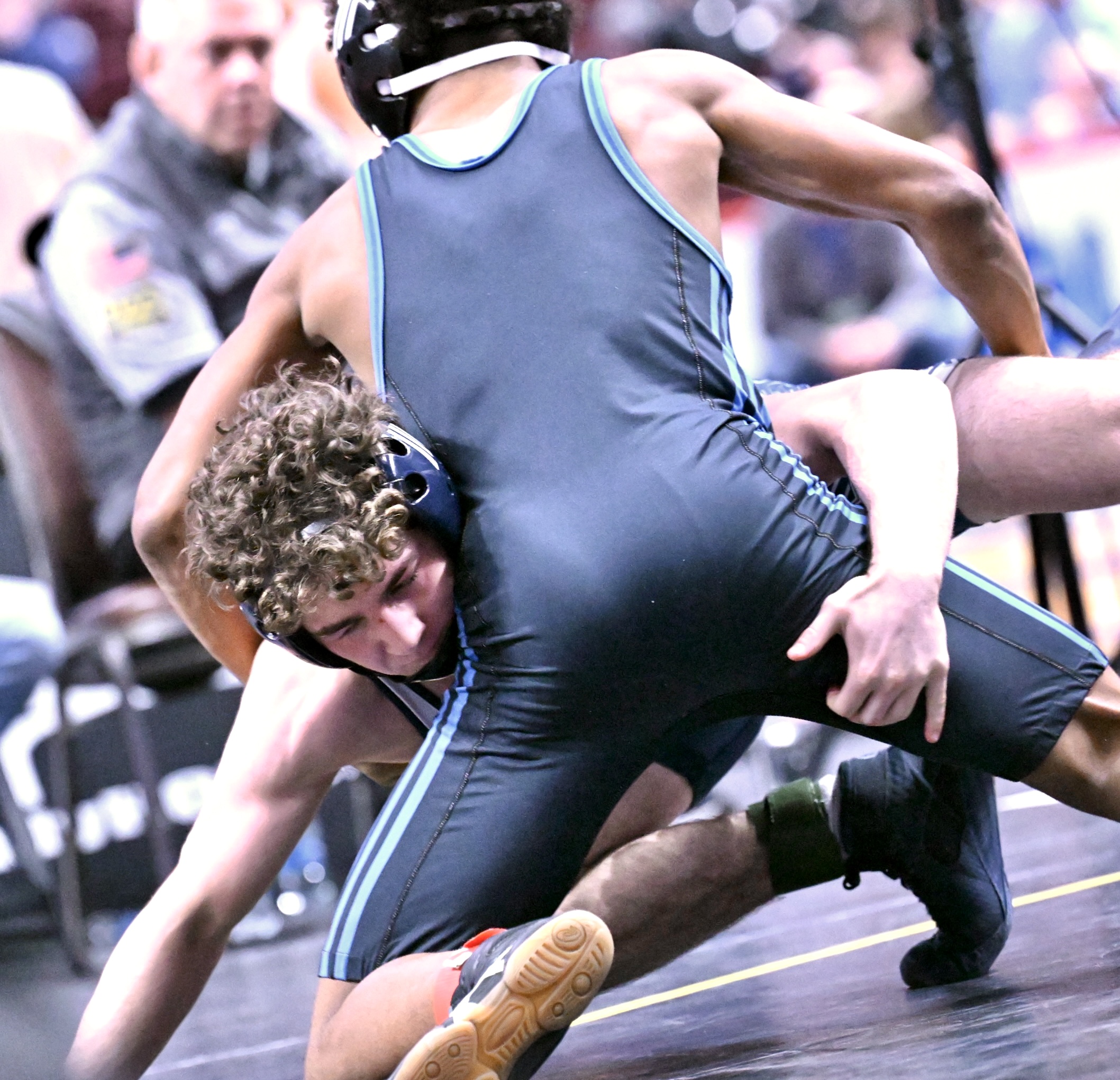 Abington Heights’ Mason Whitney, left, wrestles Nazareth’s Caleb Kosko in...