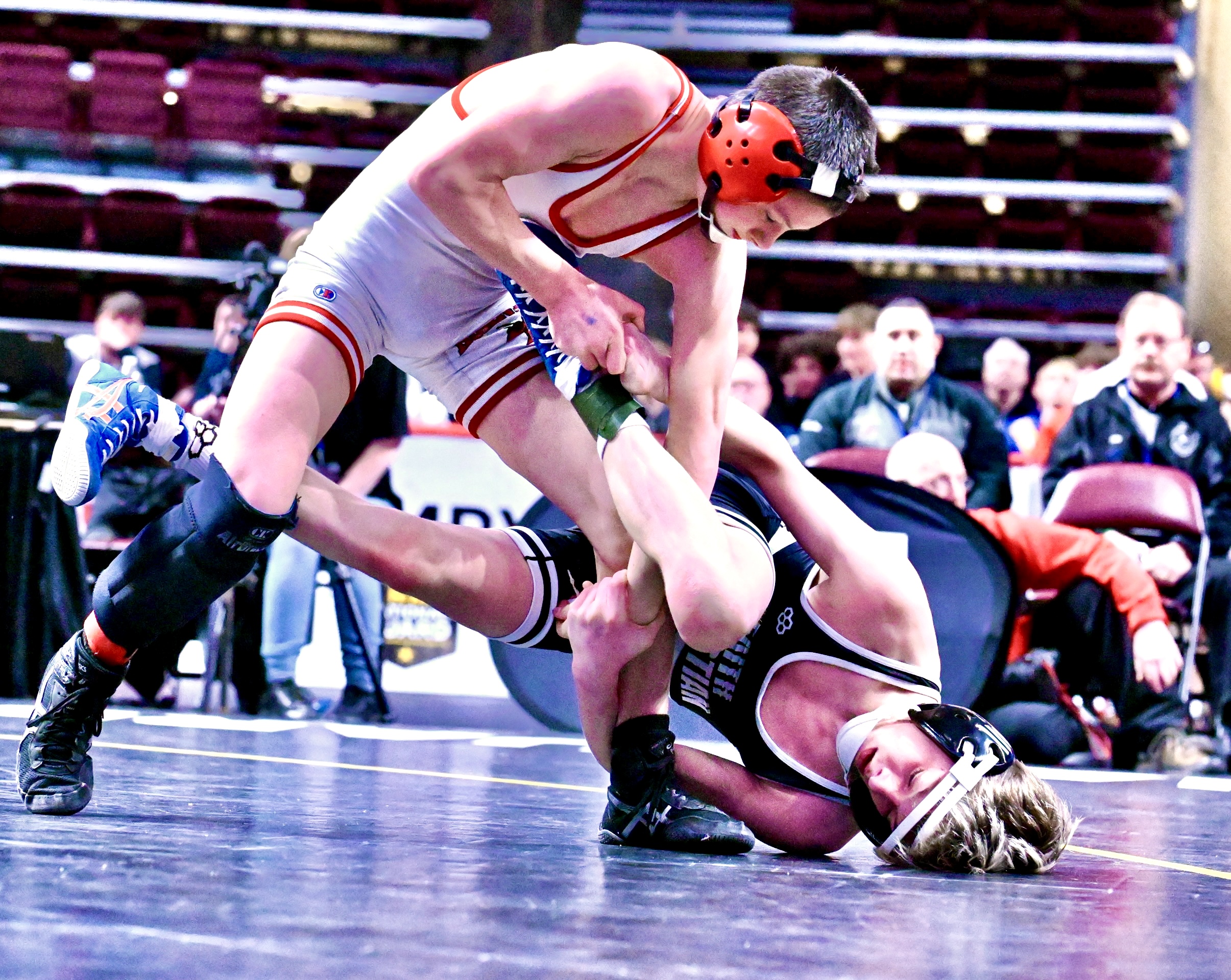 Honesdale’s Nathan Schuman, left, wrestles Faith Christian’s Riley Crandall in...