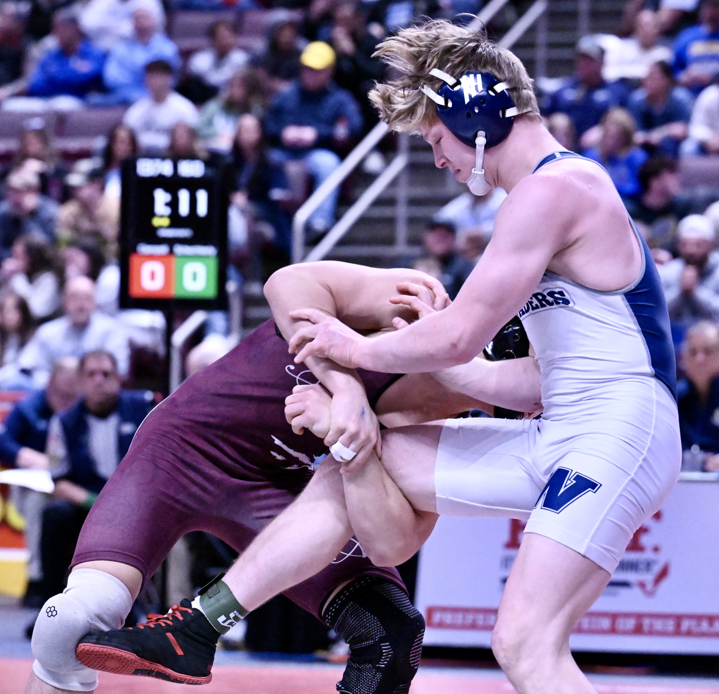 West Scranton’s Tommy Schechterly, right, wrestles Altoona’s Gavin Ciampoli during...