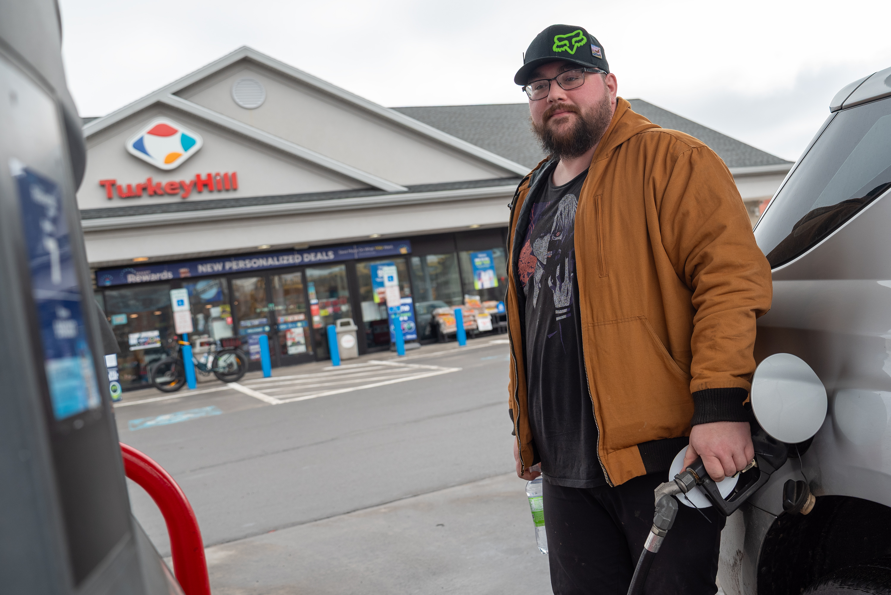 Rich Myerski fills up his vehicle at the Turkey Hill...