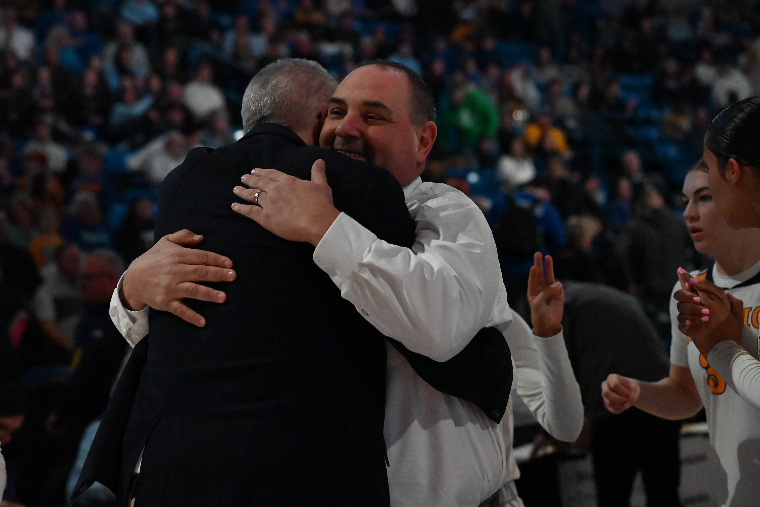 Valley View’s head coach Robbie Martin embraces Scranton Prep’s Bob...