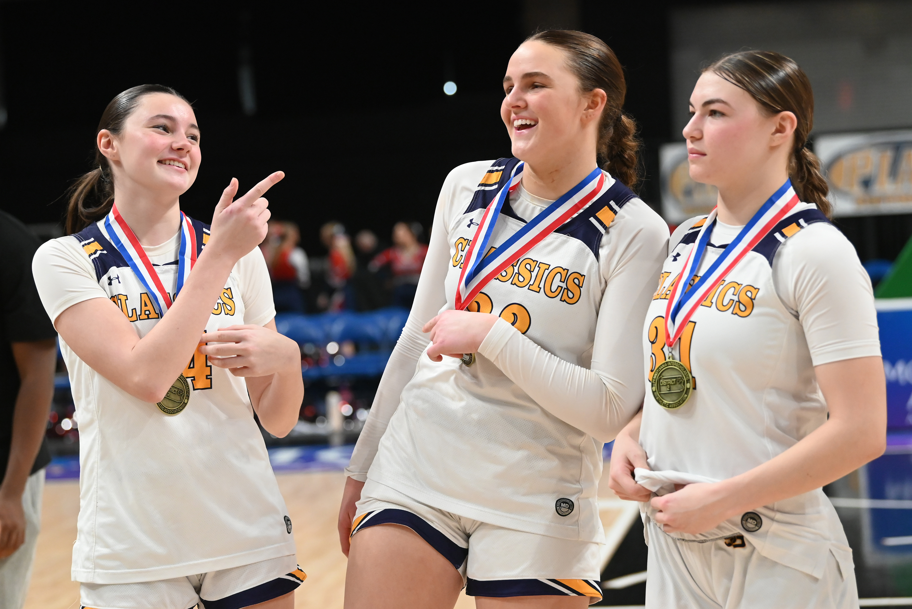 Scranton Prep’s Madeline Flynn (44), Chloe Mamera (32), and Eva...
