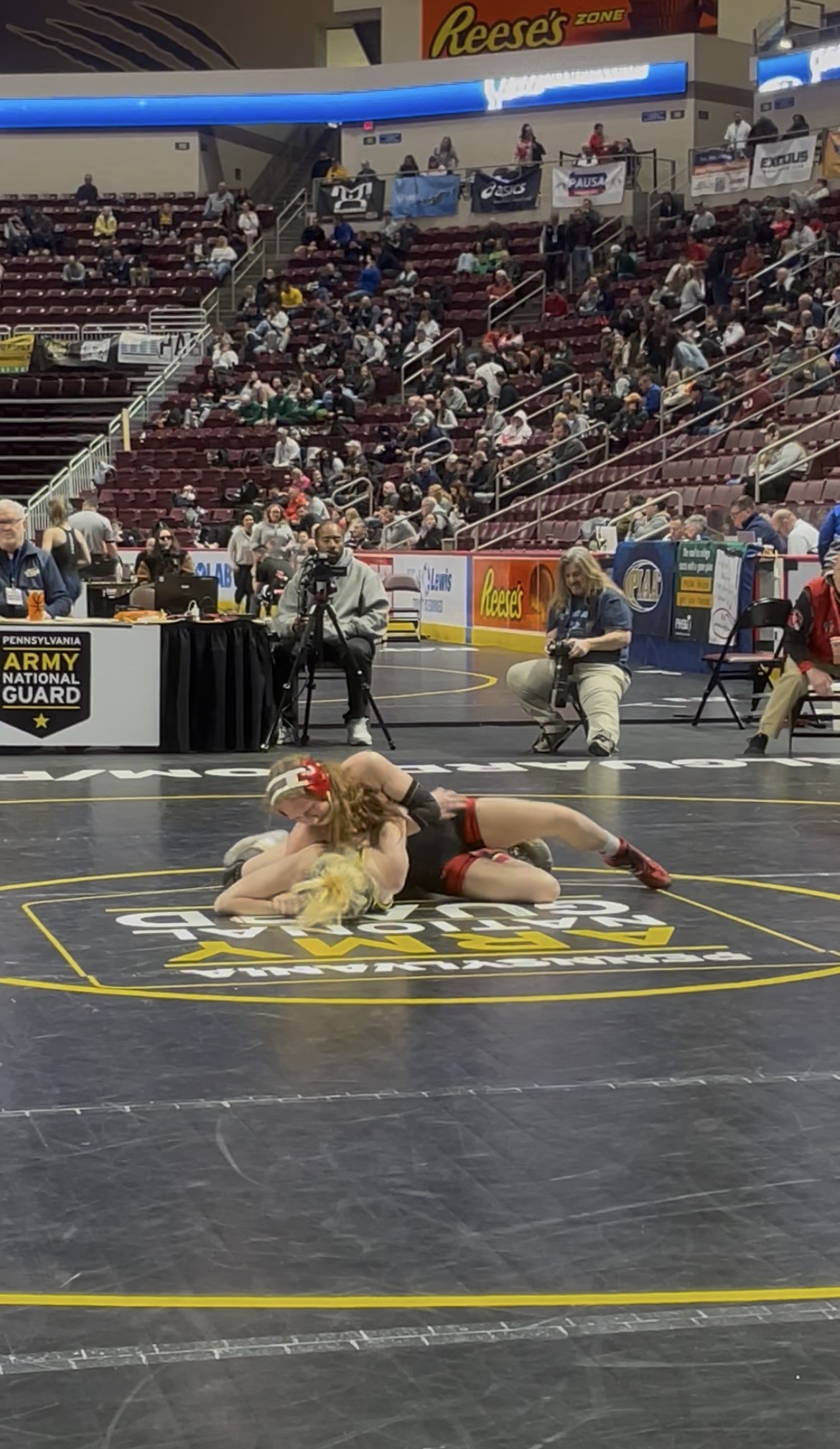Lackawanna Trail’s Cidney Schaffer, top, wrestles Central Dauphin’s Kate Hollinger...