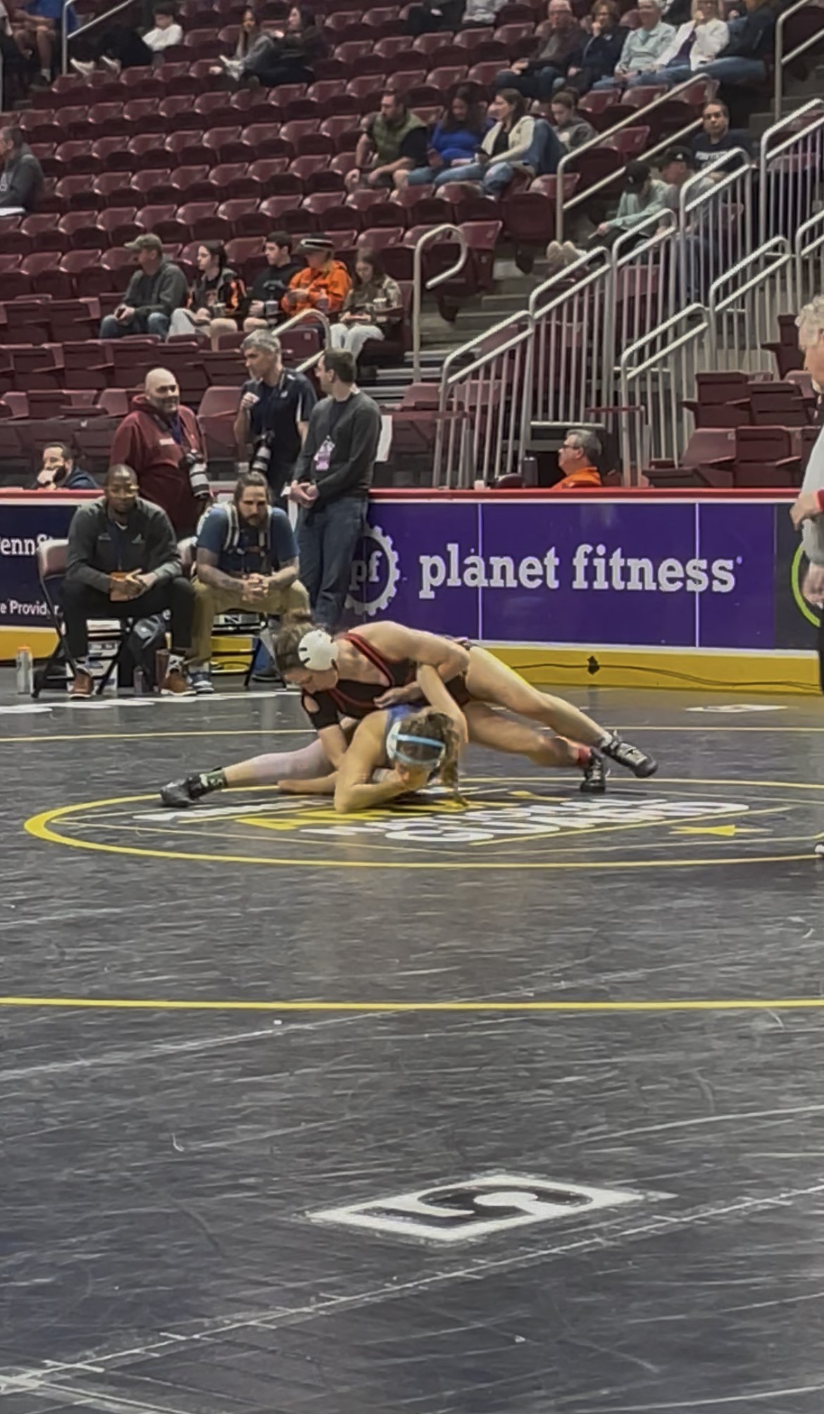 Honesdale’s Saige Olver, top, wrestles Bensalem’s Payton Hinkle in the...