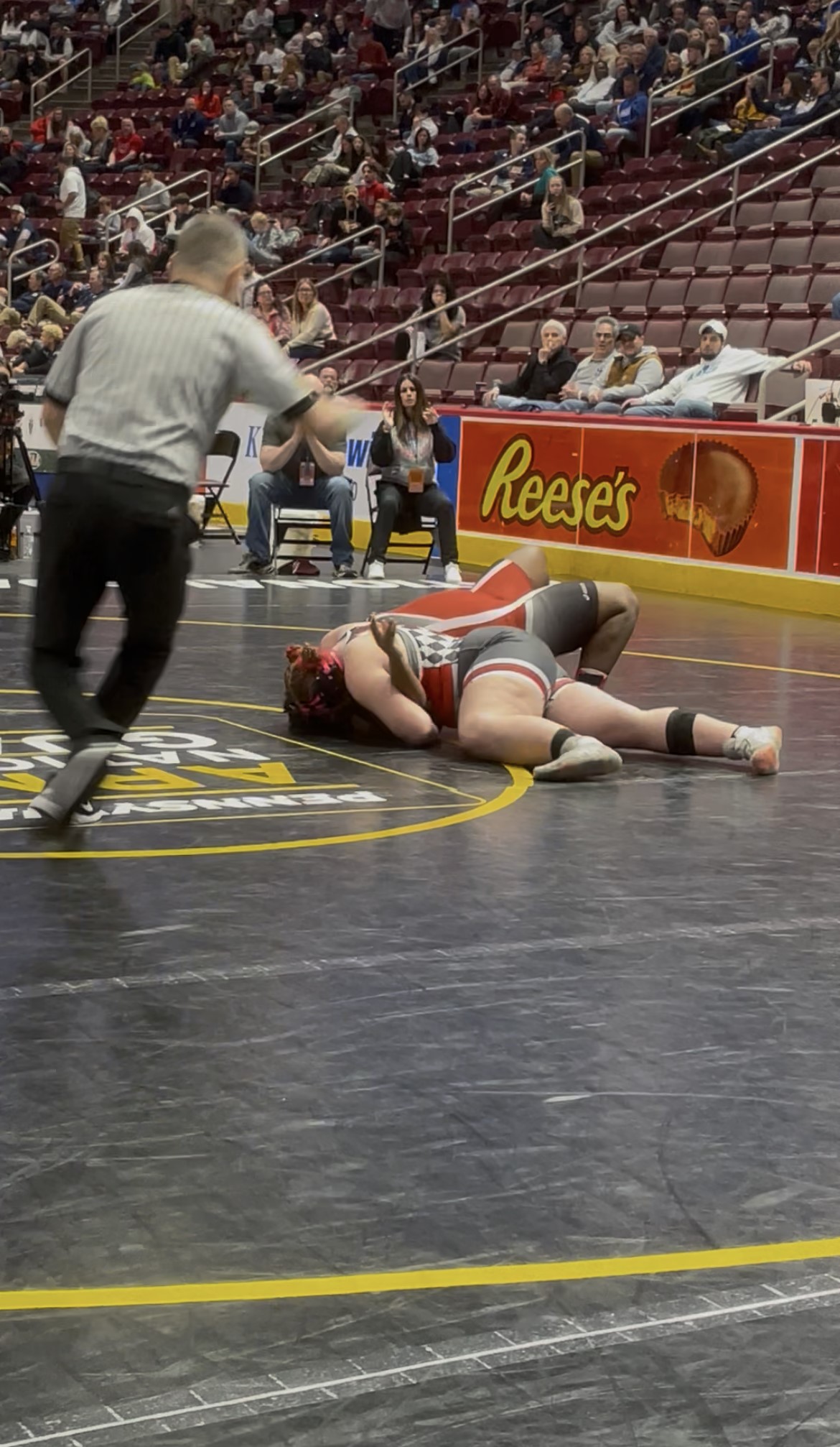 Hazleton Area’s Evelyn Sheer, top, wrestles Crestwood’s Samara Bailey in...