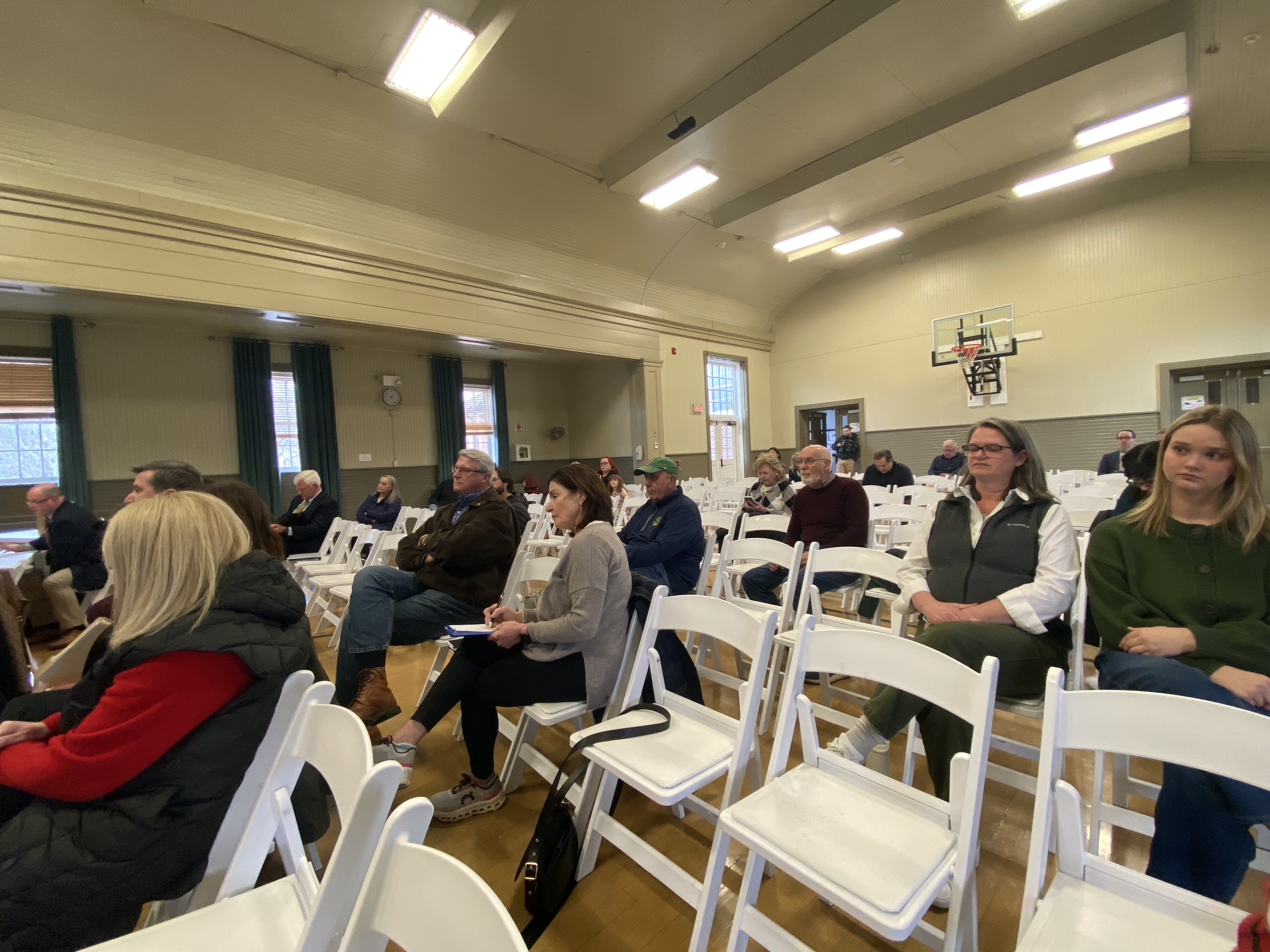 People gather for the Waverly Twp. Zoning Hearing Board meeting...