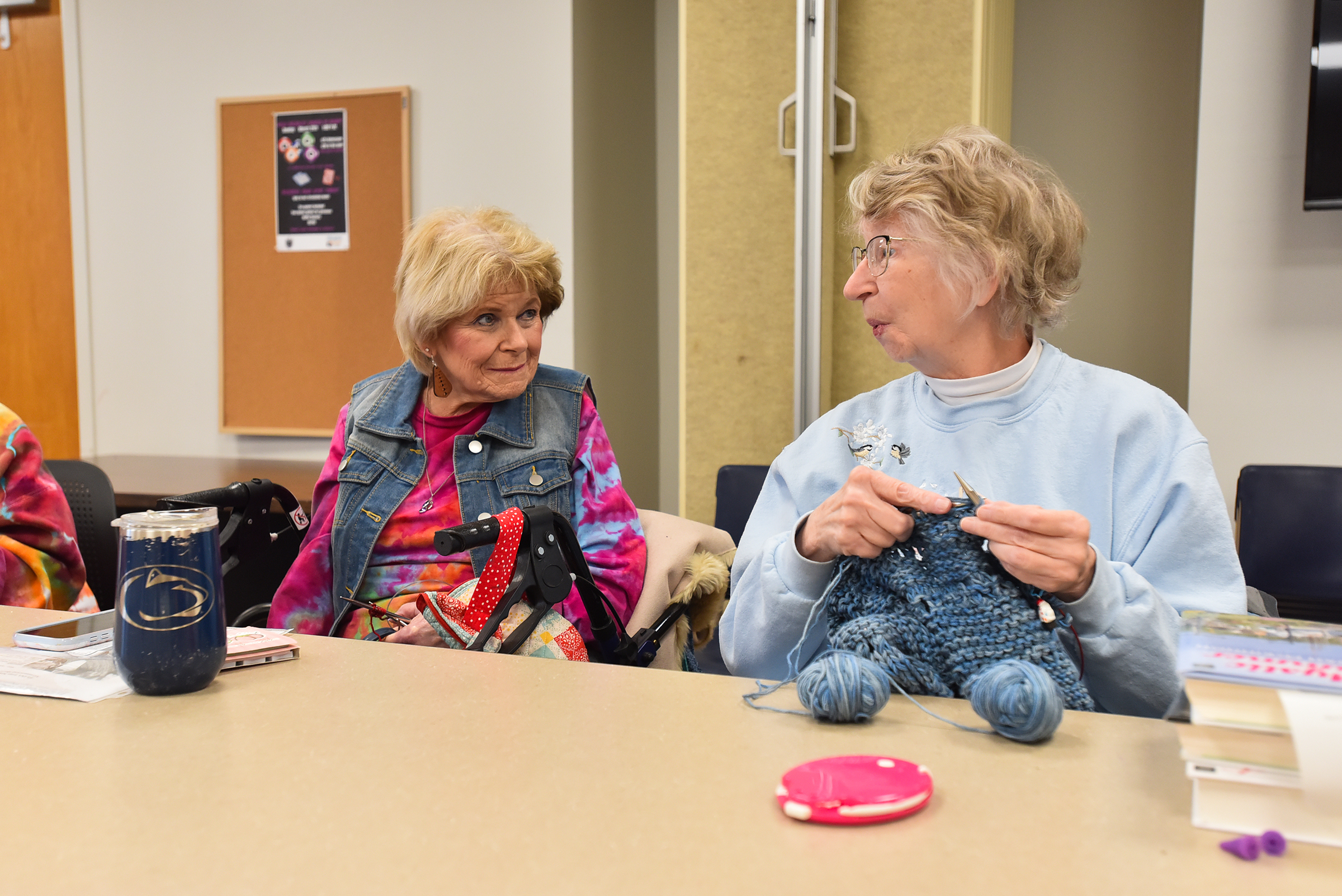Kathy Ungarvsky, of Scranton, talks with Sandy Batton, of Clarks...