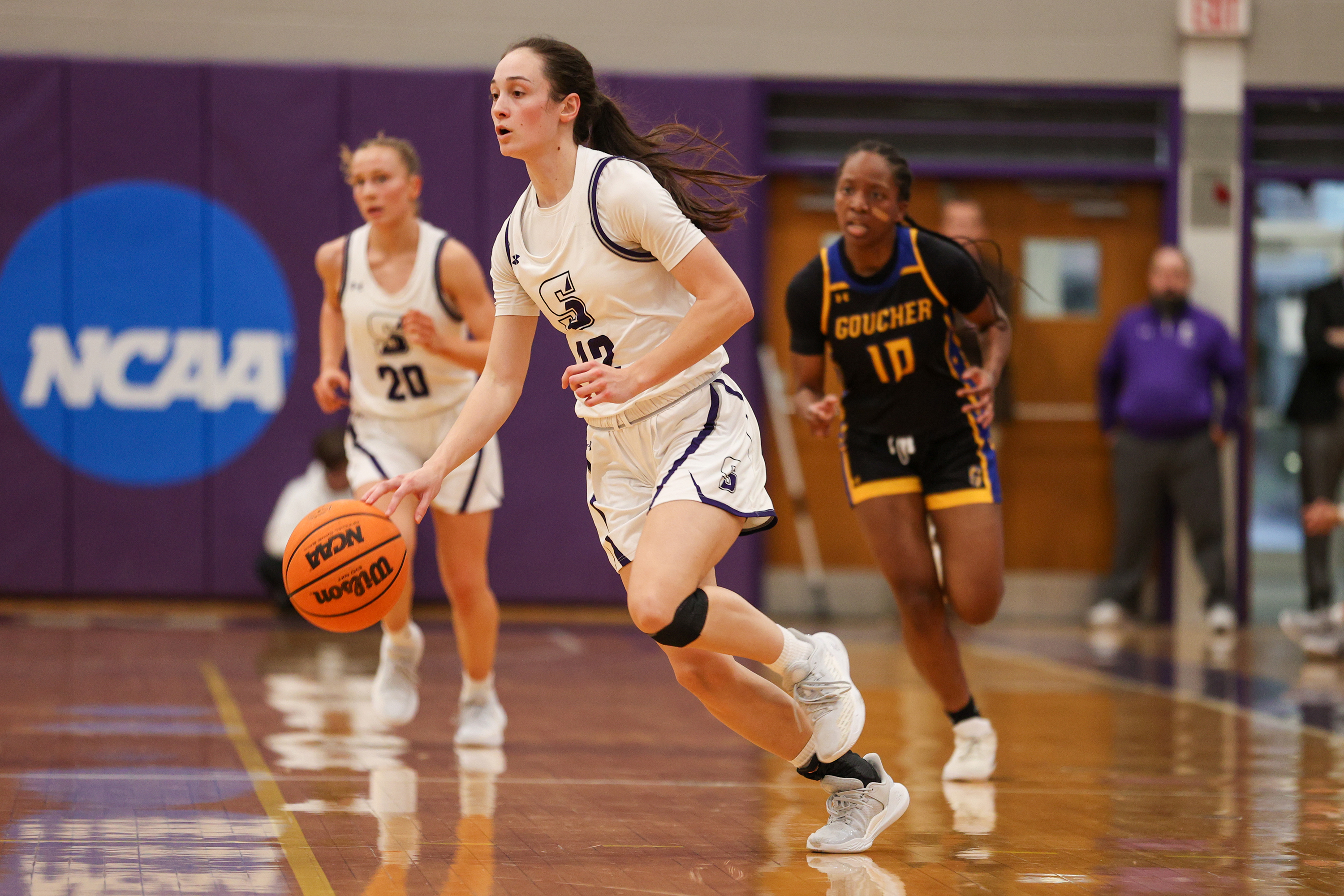 Scranton’s Jenna Sloan dribbles the ball down the court during...