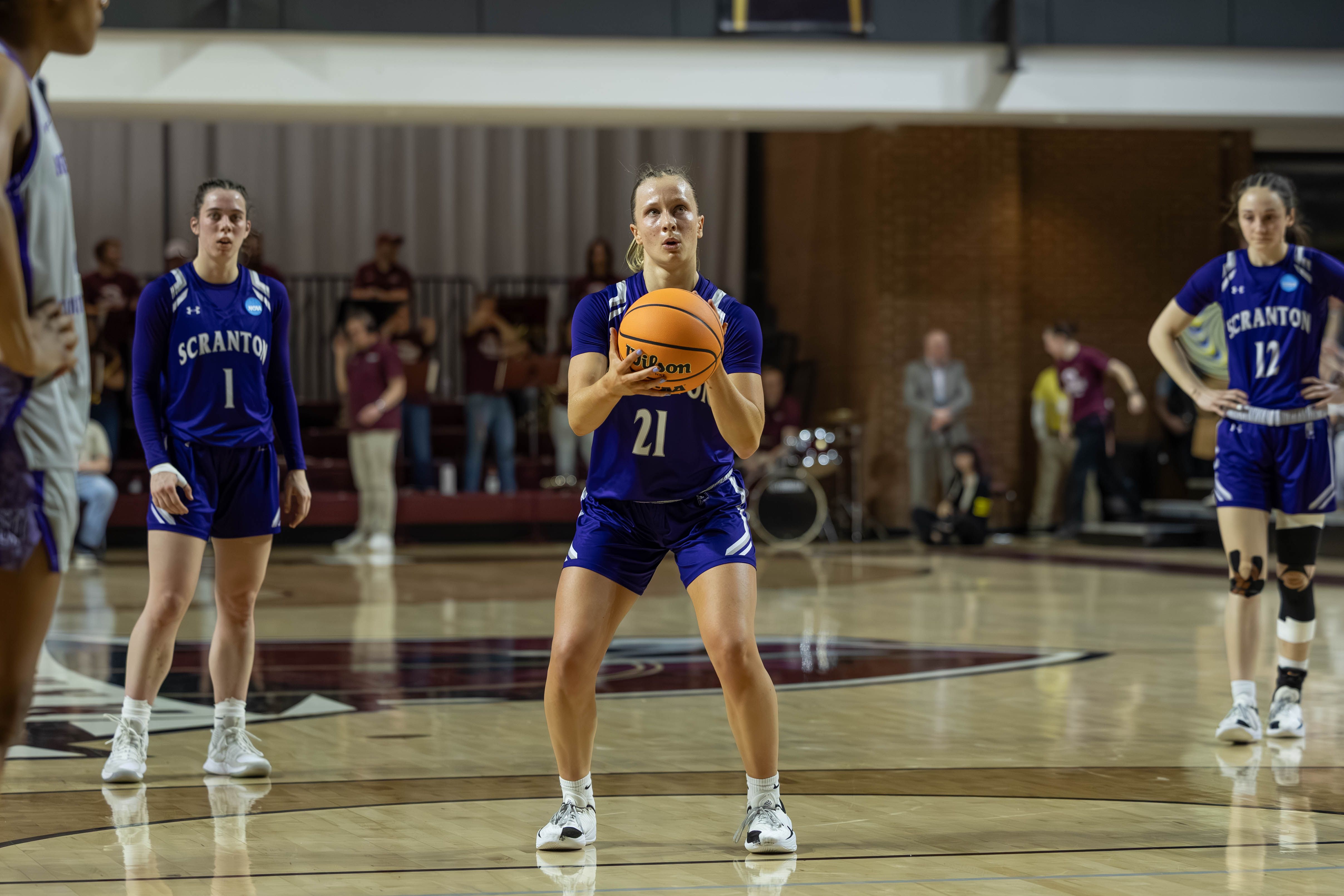 Meghan Lamanna of the University of Scranton eyes up a...