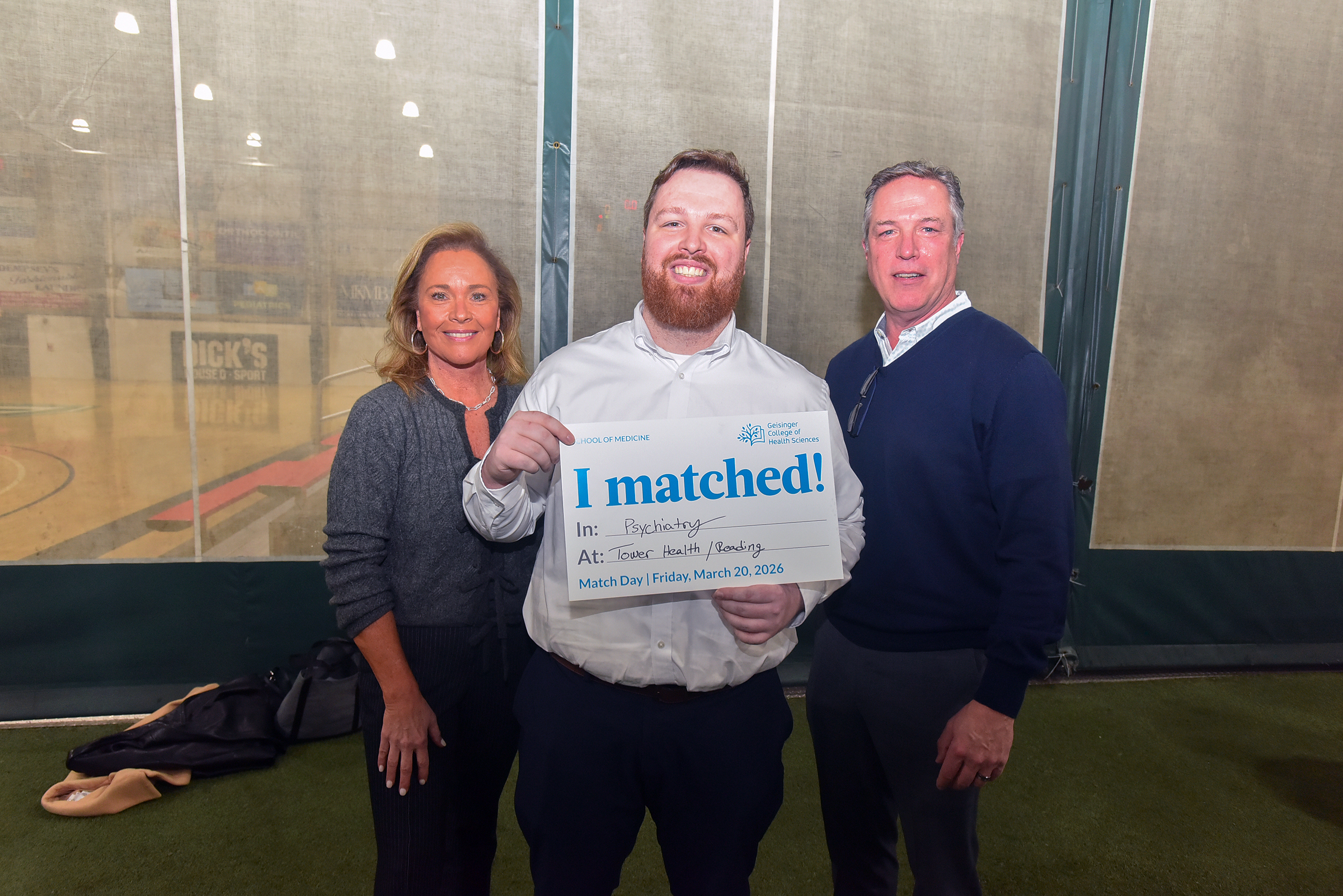 Jason Tinsley, of Clarks Summit, center, poses for a photograph...