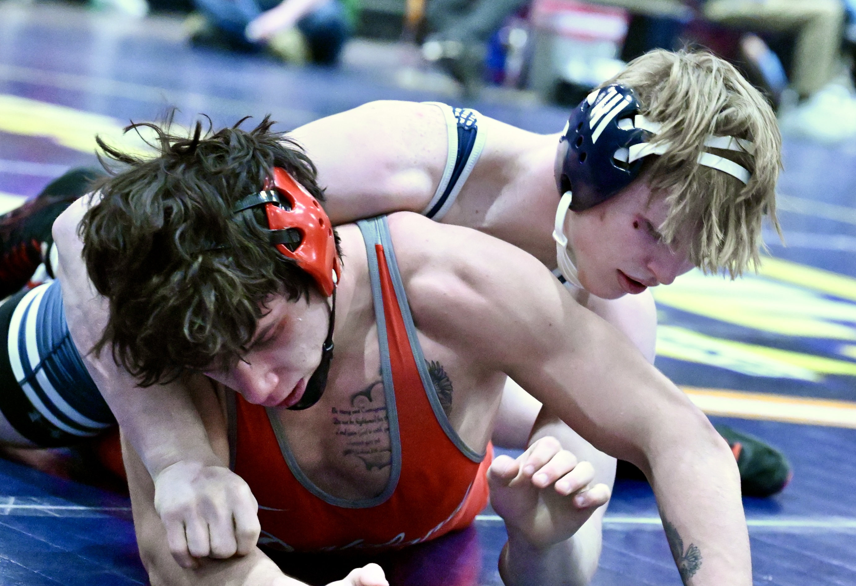 West Scranton’s Tommy Schechterly, top, wrestles Parkland’s Jorge Moya in...