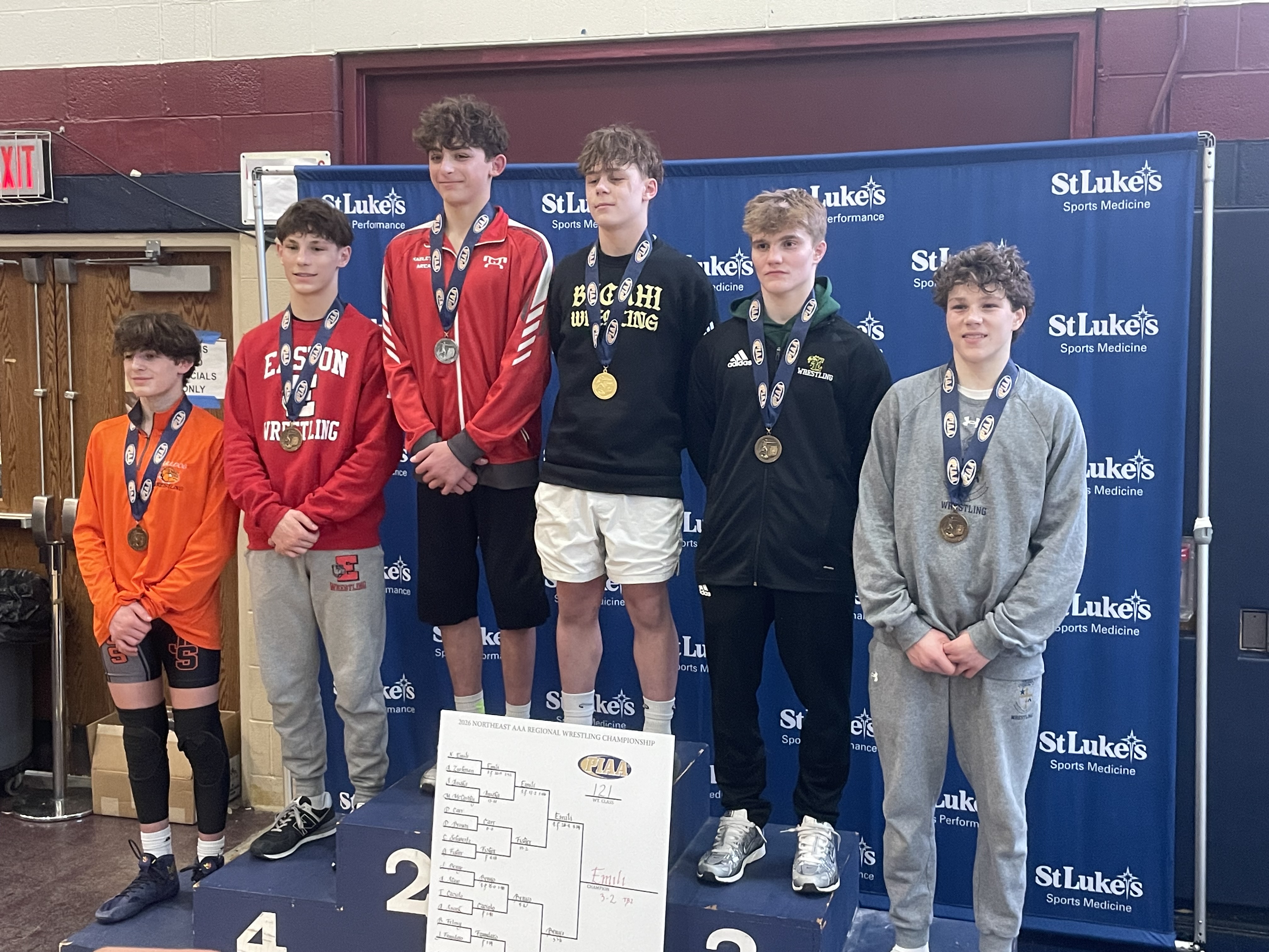 Hazleton Area’s Jake Benyo (second place) on the 121-pound podium....