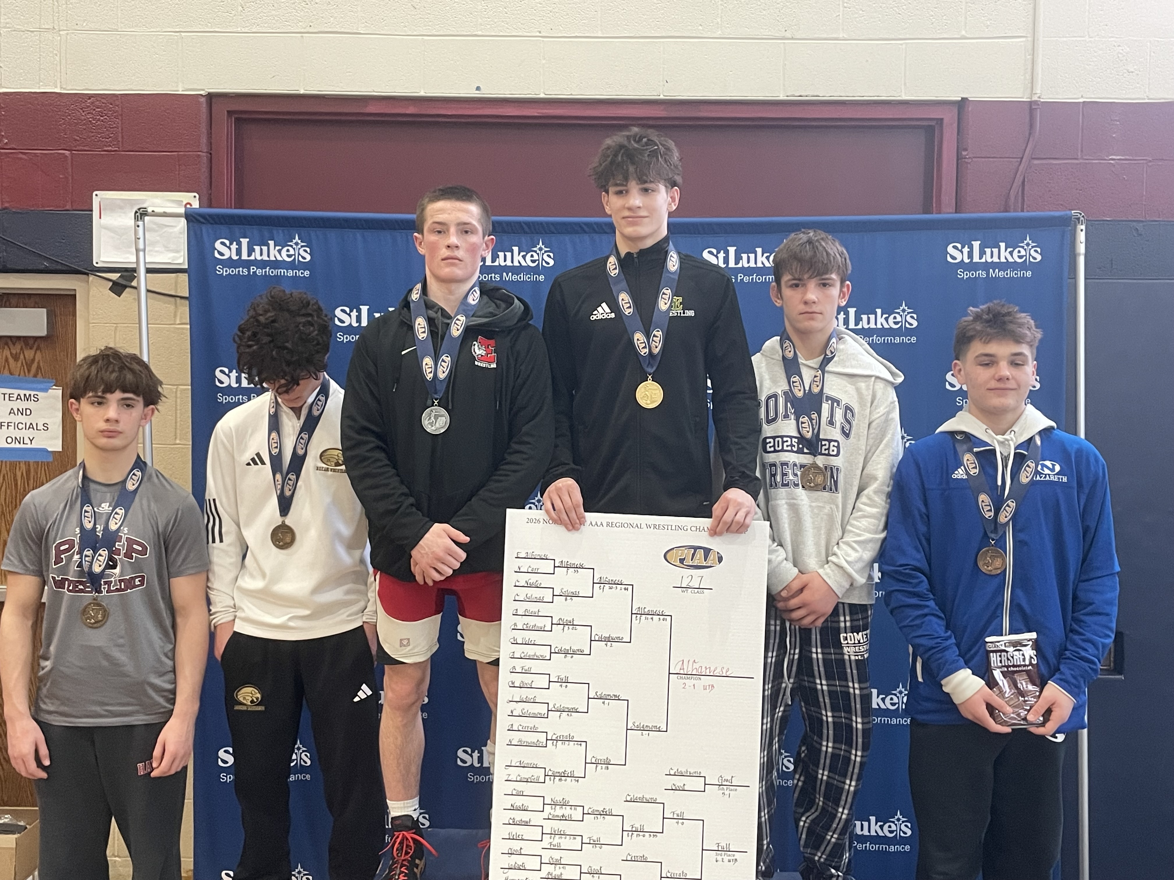 Abington Heights’ Brady Full (third place) on the 127-pound podium....