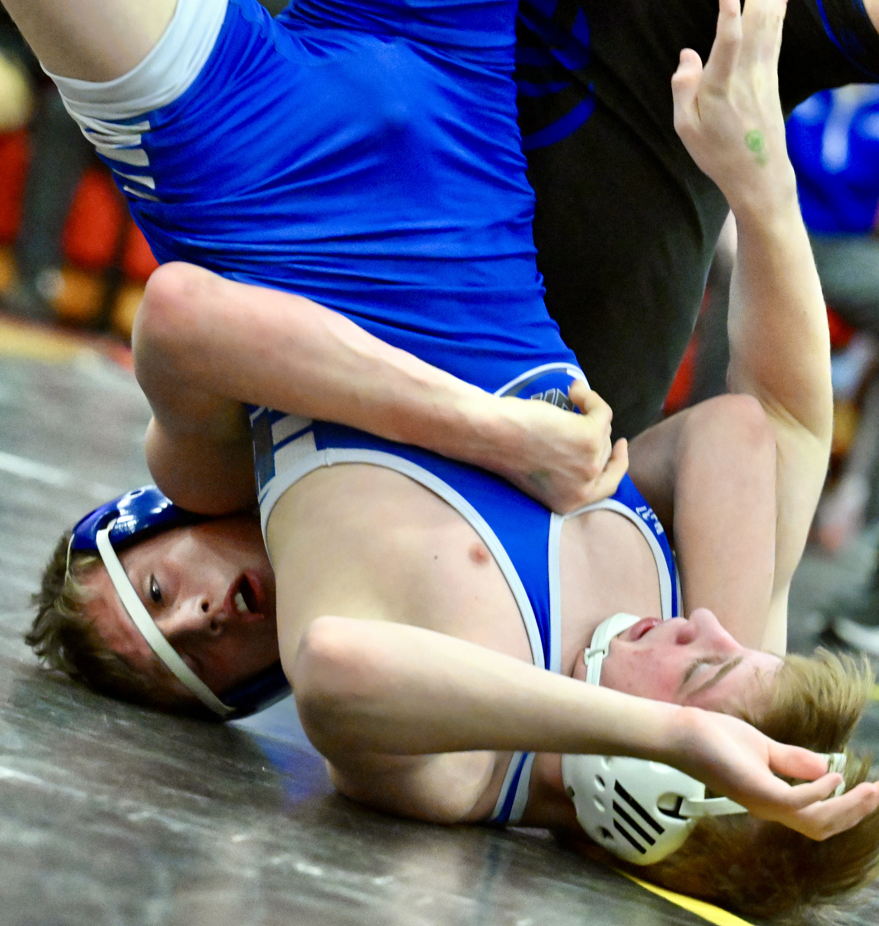 Hanvoer Area’s CJ Caines, left, wrestlers Warrior Run’s Wirnsberger in...