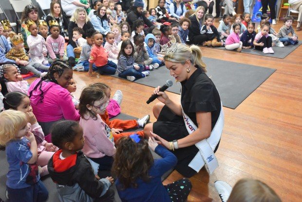 Miss Pennsylvania 2025 Victoria Vespico interacts with Pre-K students during a visit to the Agency for Community EmPOWERment of NEPA Monday, March 23, 2026. (SEAN MCKEAG / STAFF PHOTOGRAPHER)