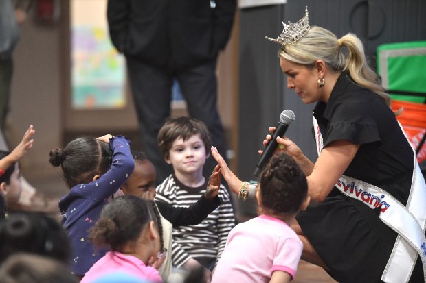 Miss Pennsylvania 2025 Victoria Vespico interacts with Pre-K students during a visit to the Agency for Community EmPOWERment of NEPA Monday, March 23, 2026. (SEAN MCKEAG / STAFF PHOTOGRAPHER)