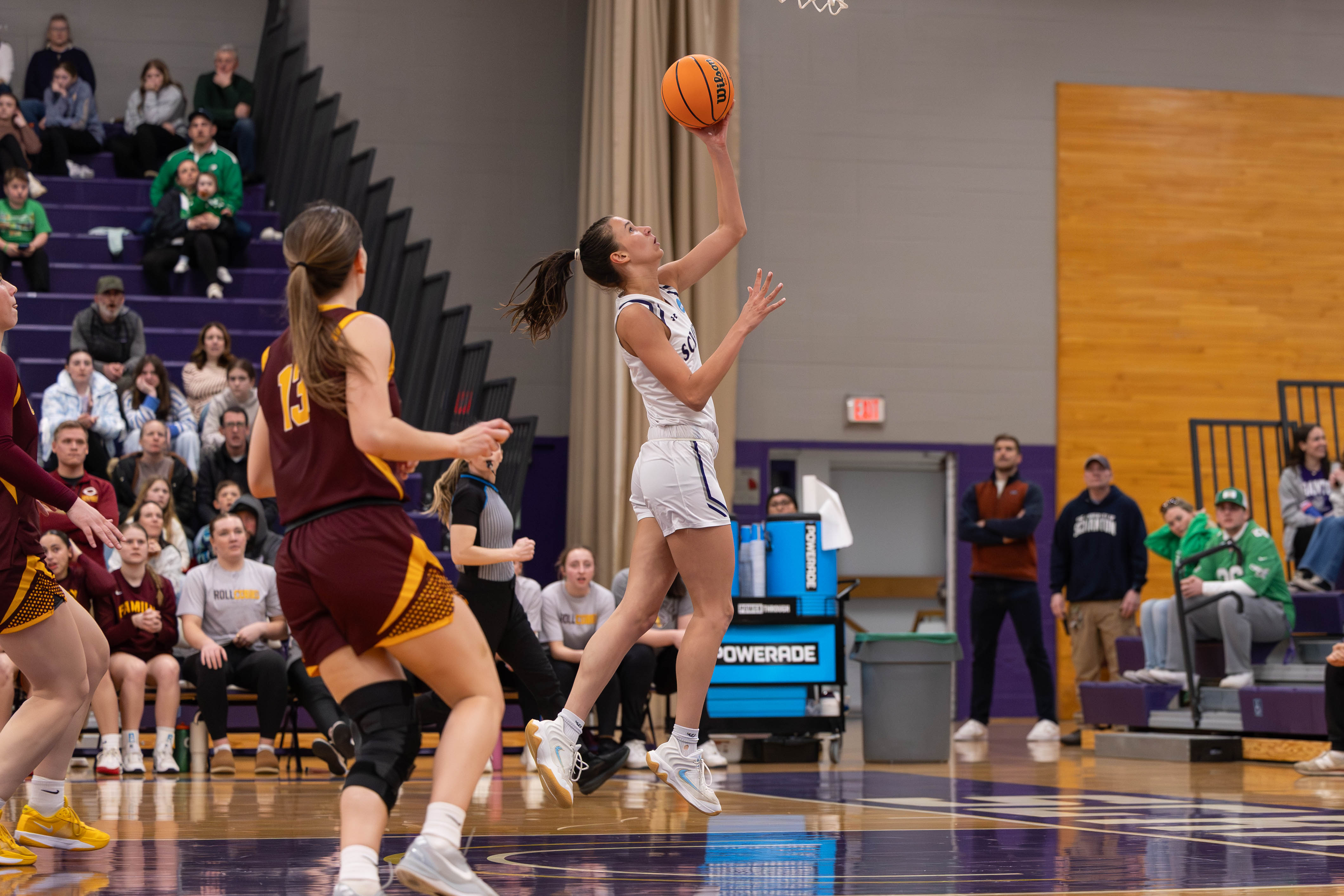 The University of Scranton’s Katie Gorski drives for a layup...